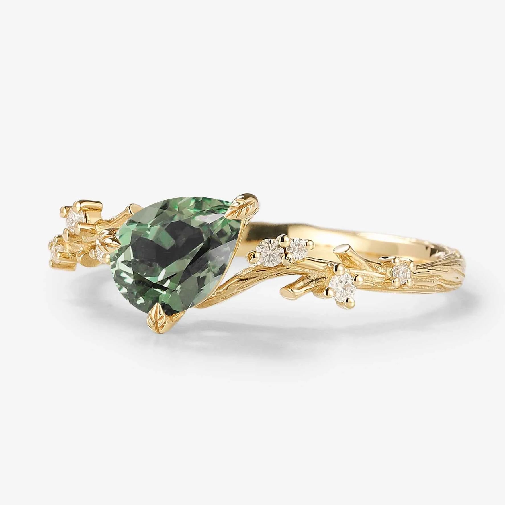 Branch & Leaf Prong Unique Tilted Pear-Cut Teal Sapphire Engagement Ring