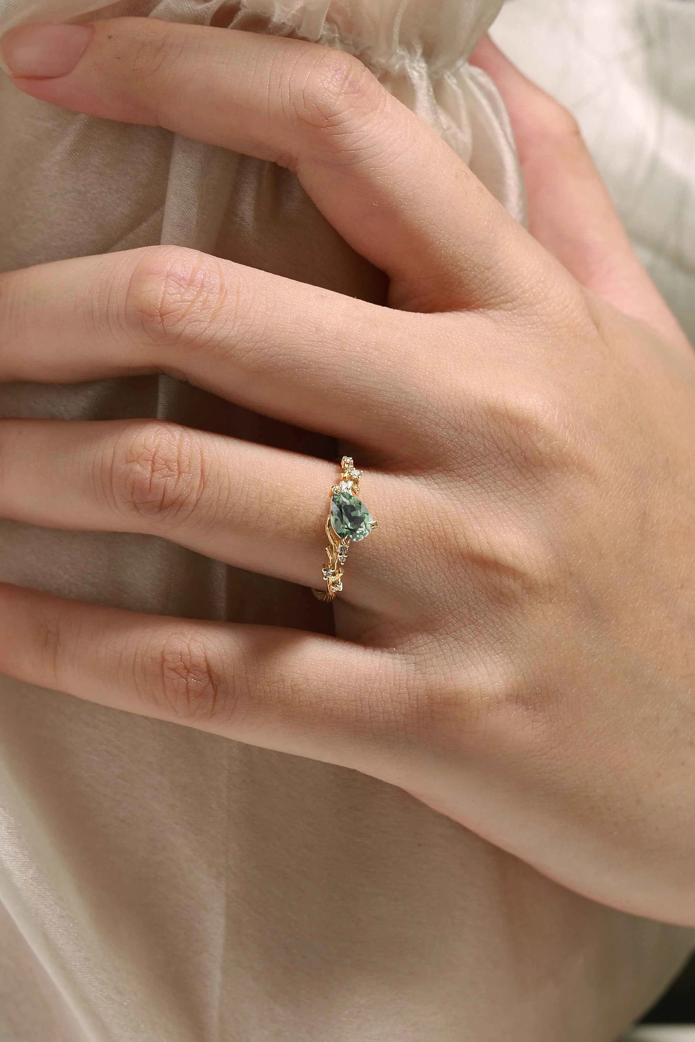 Branch & Leaf Prong Unique Tilted Pear-Cut Teal Sapphire Engagement Ring