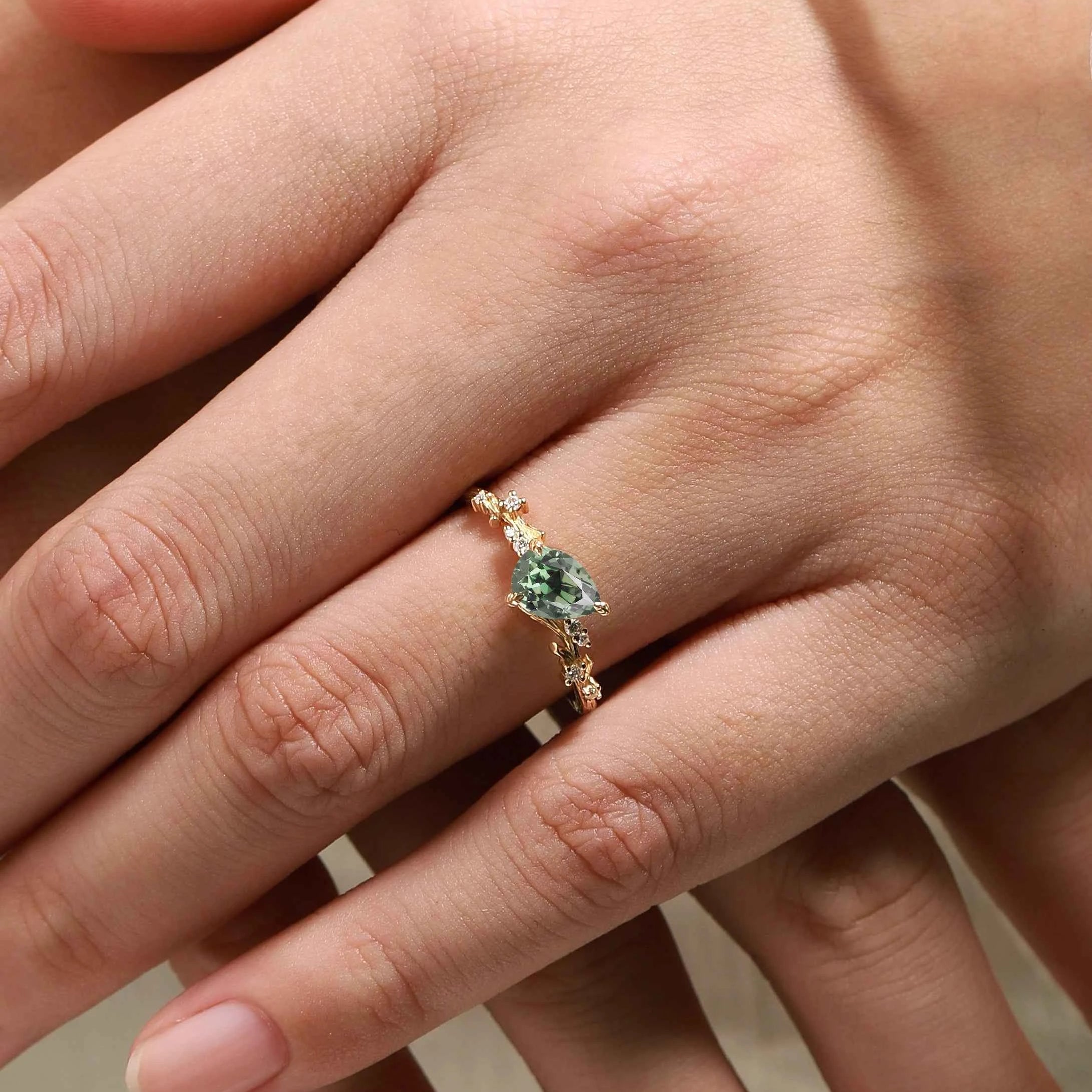 Branch & Leaf Prong Unique Tilted Pear-Cut Teal Sapphire Engagement Ring