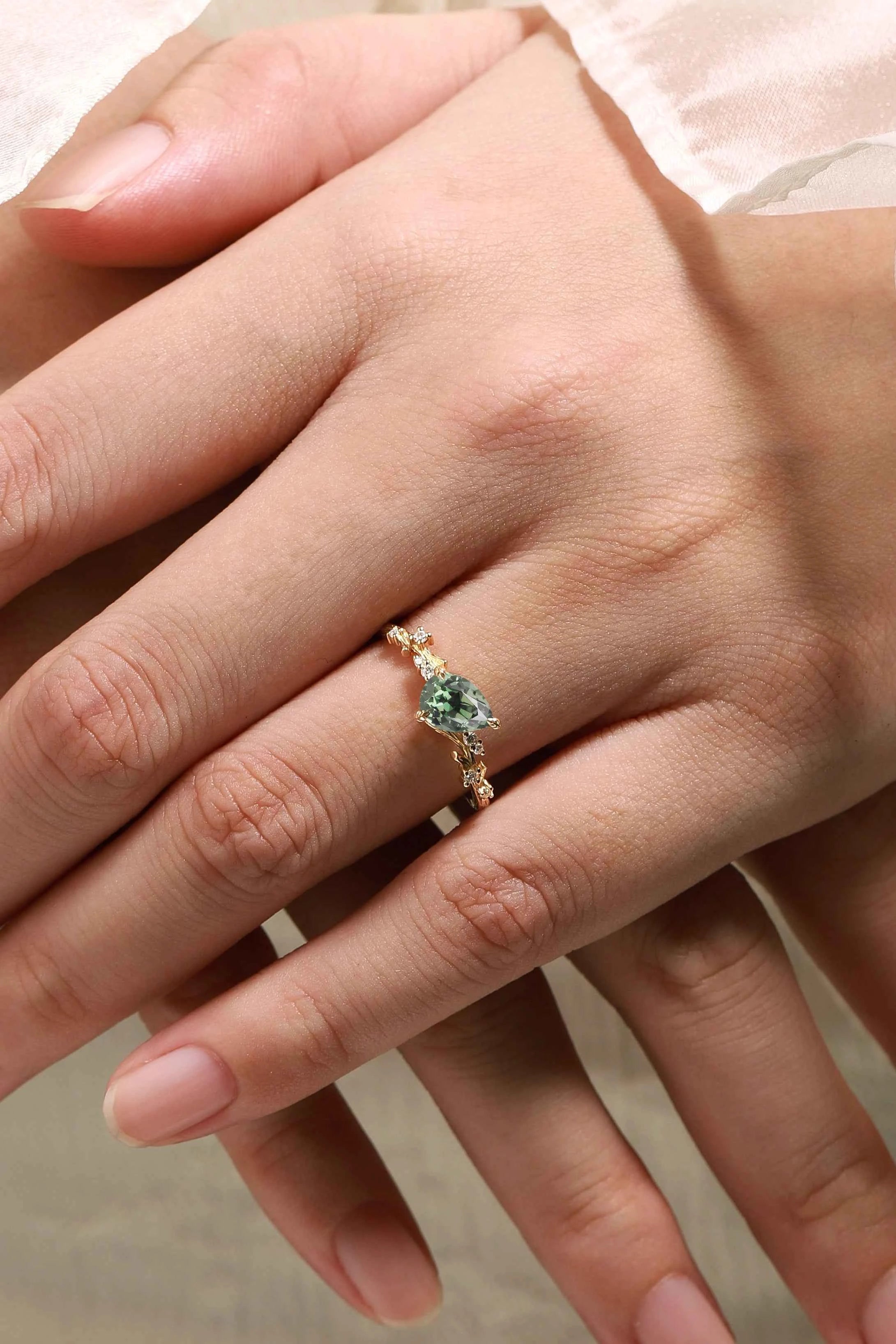 Branch & Leaf Prong Unique Tilted Pear-Cut Teal Sapphire Engagement Ring