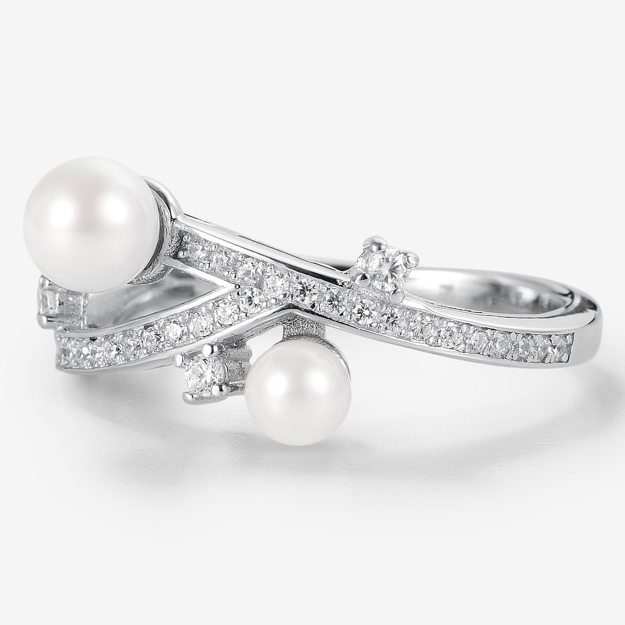 Pearl engagement ring with moissanite accents and unique design