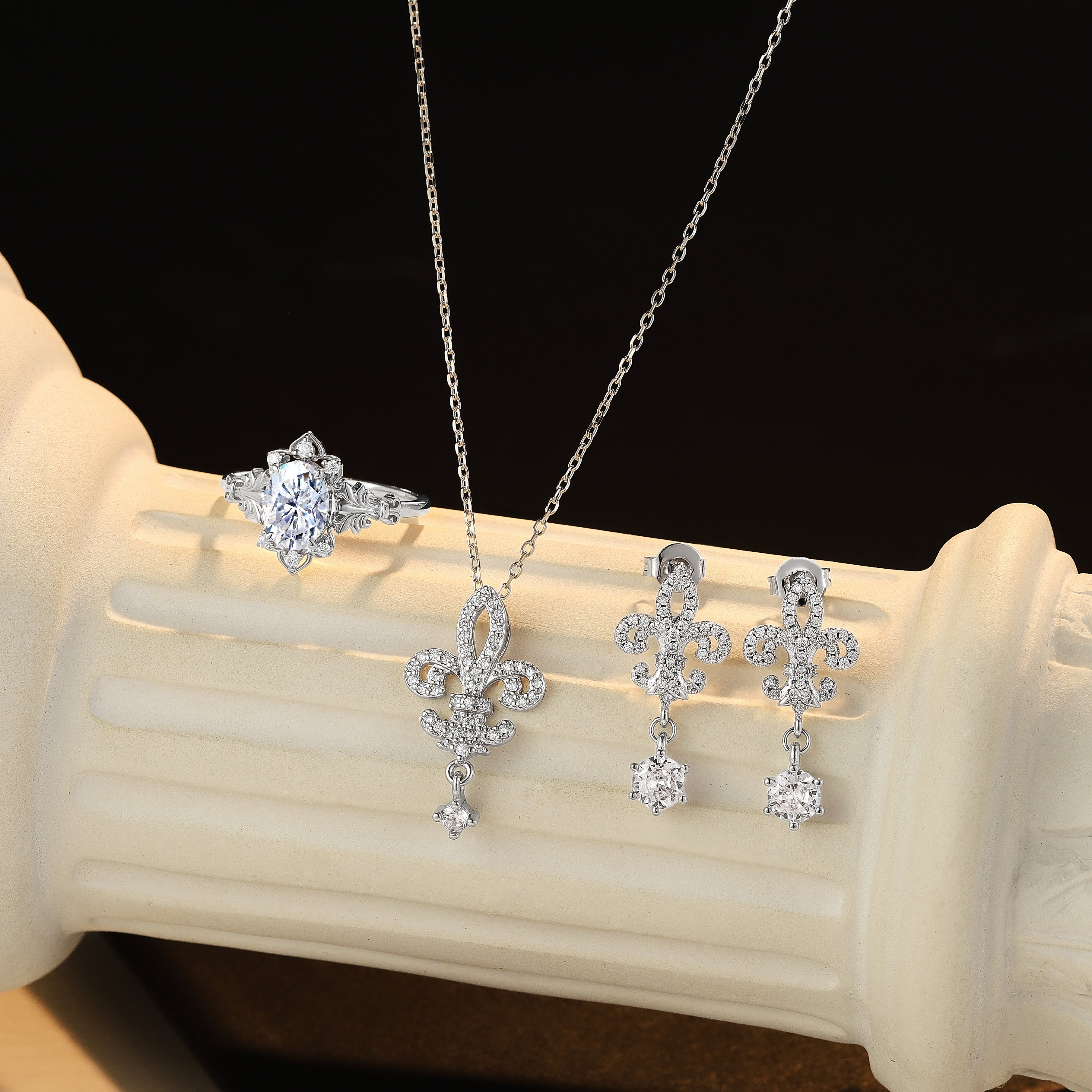 Floral jewelry set with ring, necklace, and earrings with moissanite