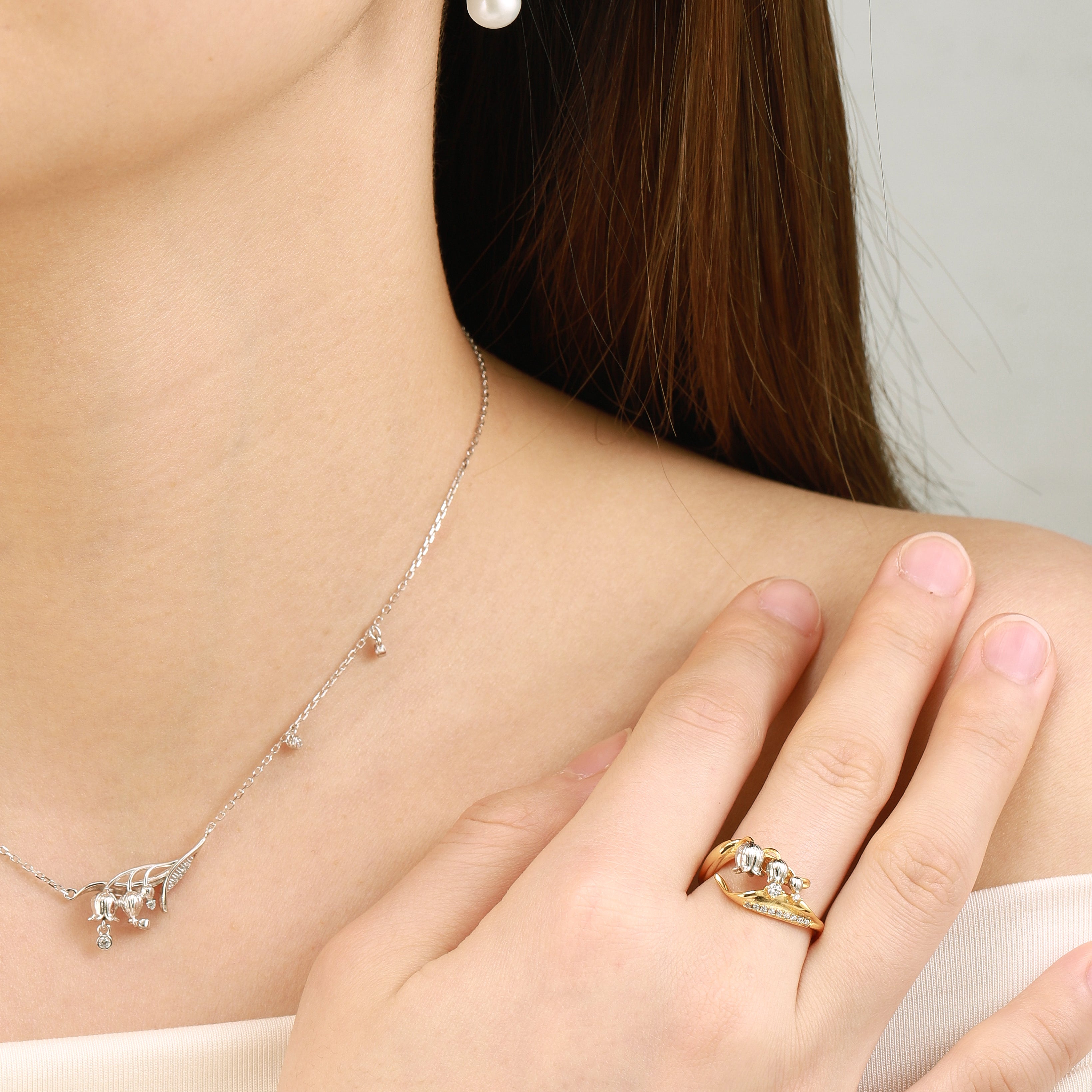 Lahela Jewelry: Nature-inspired Lily of the Valley jewelry set, gold ring, earrings, and necklace