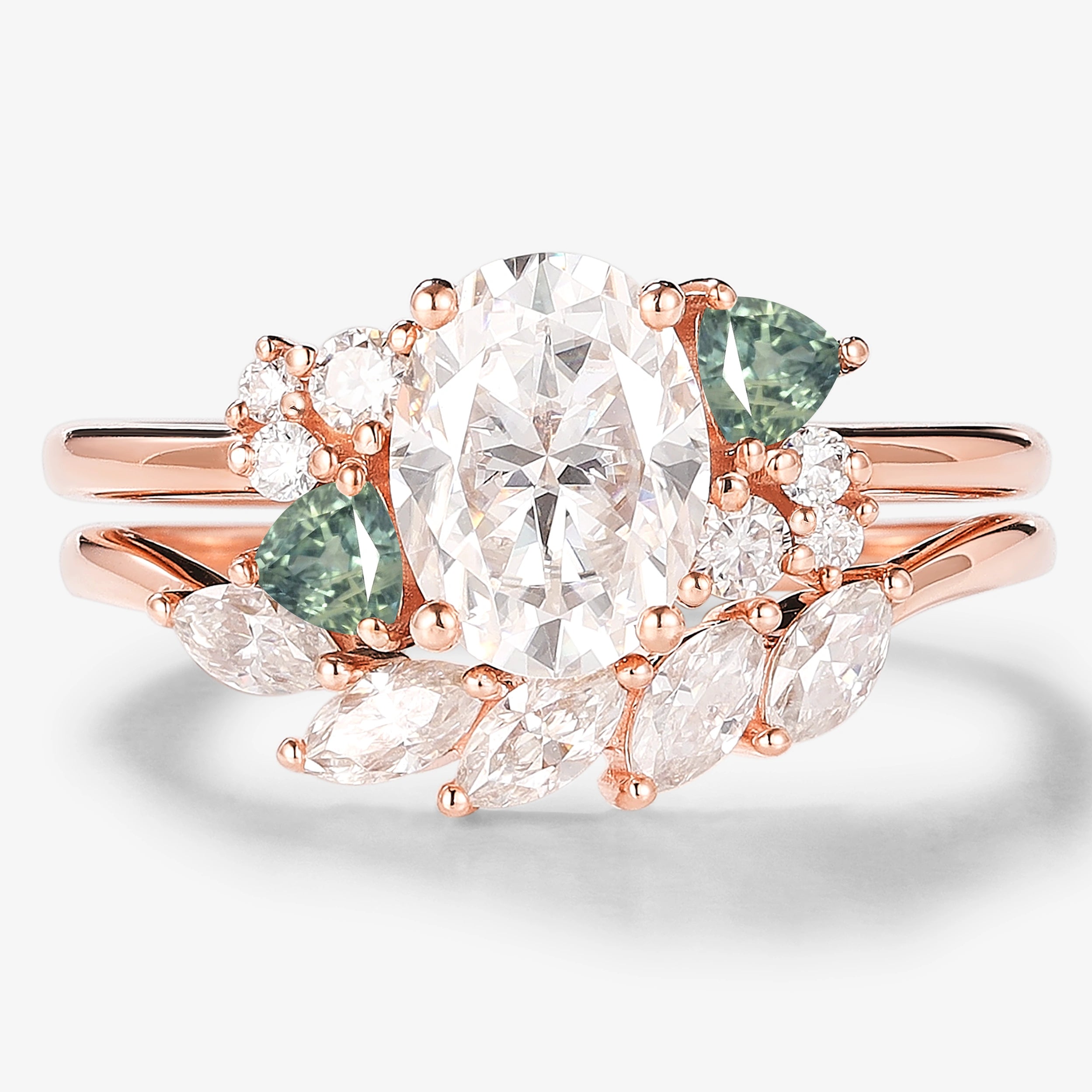Oval moissanite bridal set with spinel accents in rose gold. Vintage engagement ring and wedding band.