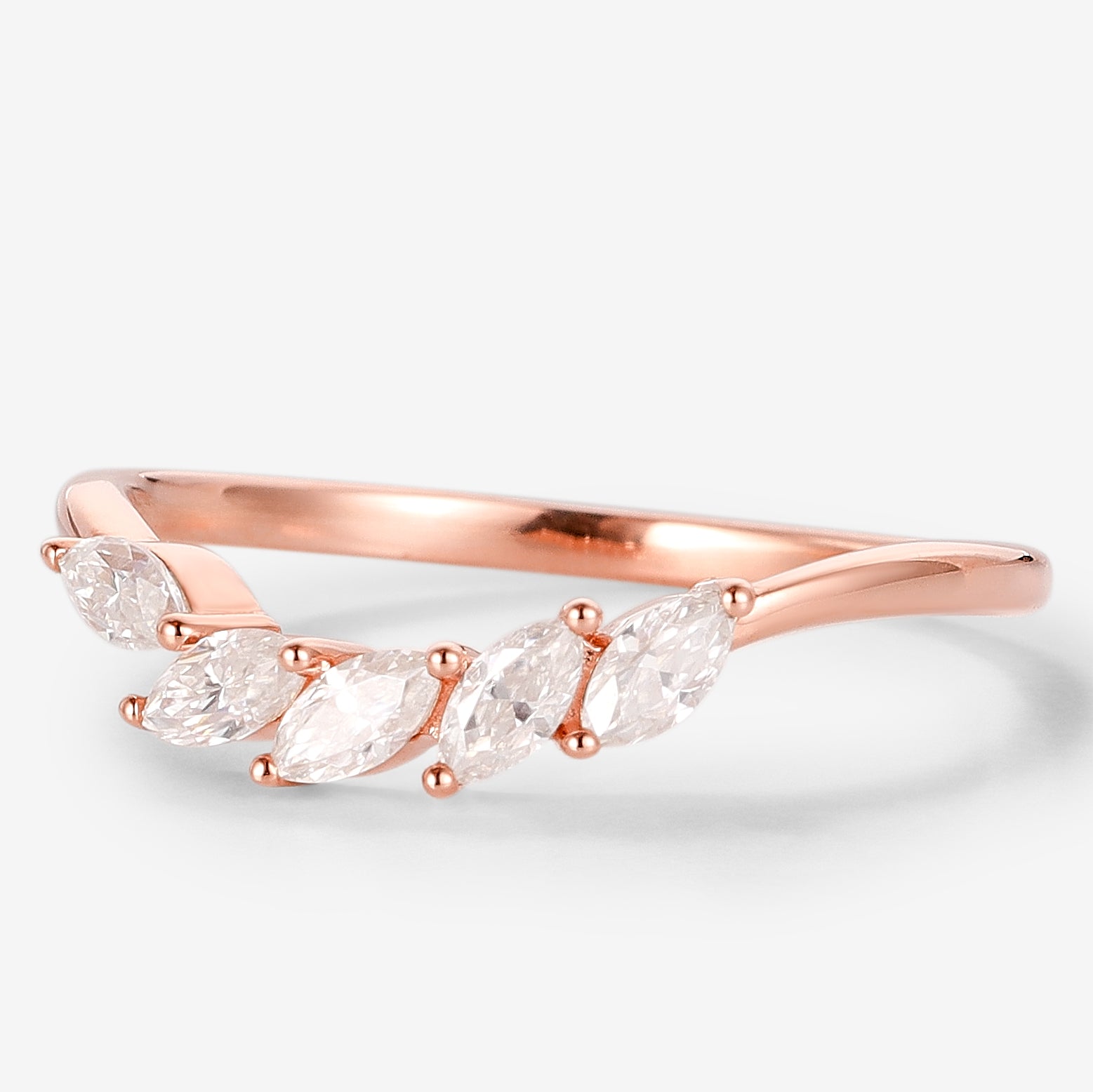 Rose gold marquise moissanite wedding band, a delicate curved design. Perfect as a bridal set or stackable ring.