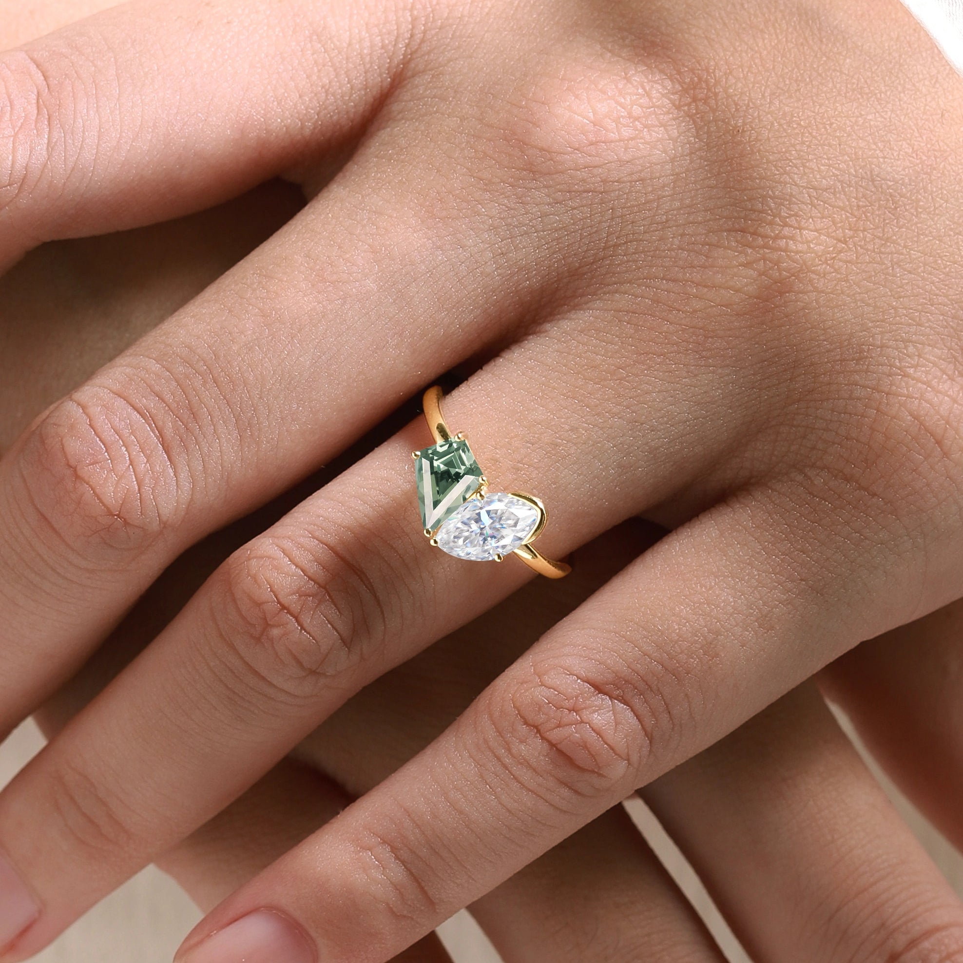 Yellow gold engagement ring with green sapphire and moissanite. Bridal set ring set.