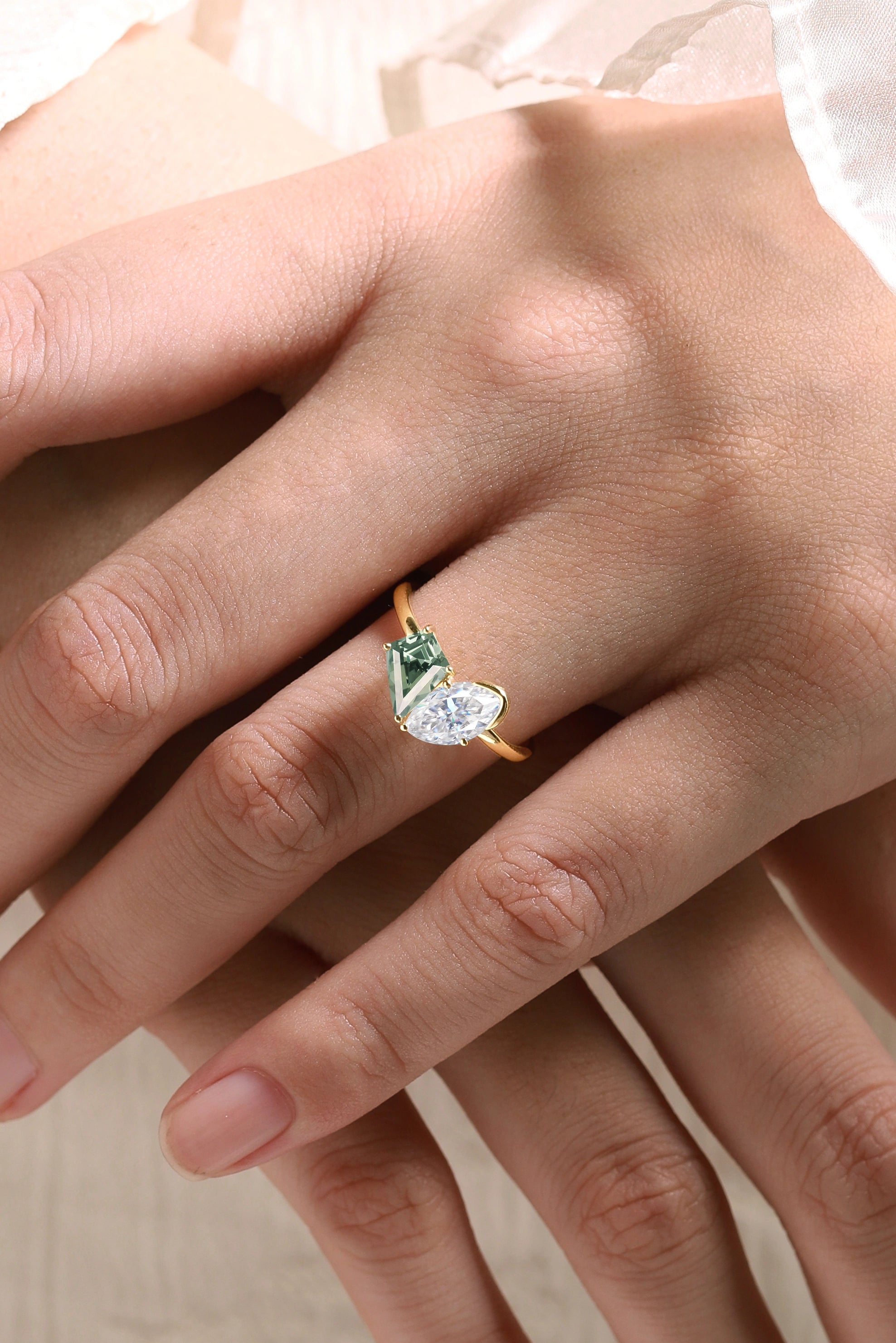 Yellow gold engagement ring with green sapphire and moissanite. Bridal set ring set.