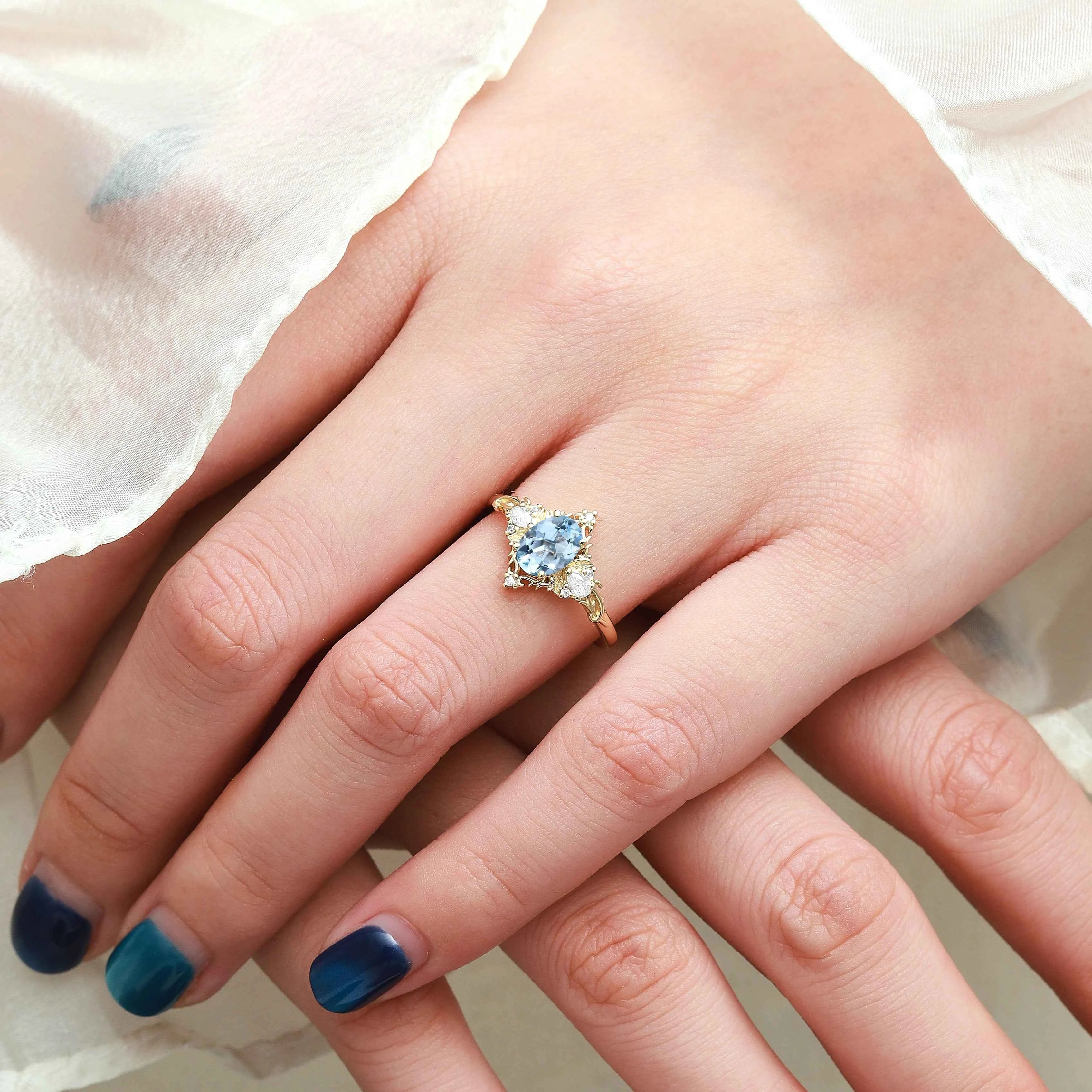 Oval Aquamarine & Pear Moissanite Engagement Ring with Leaf Motifs and Vine-Style Band - Seraphina