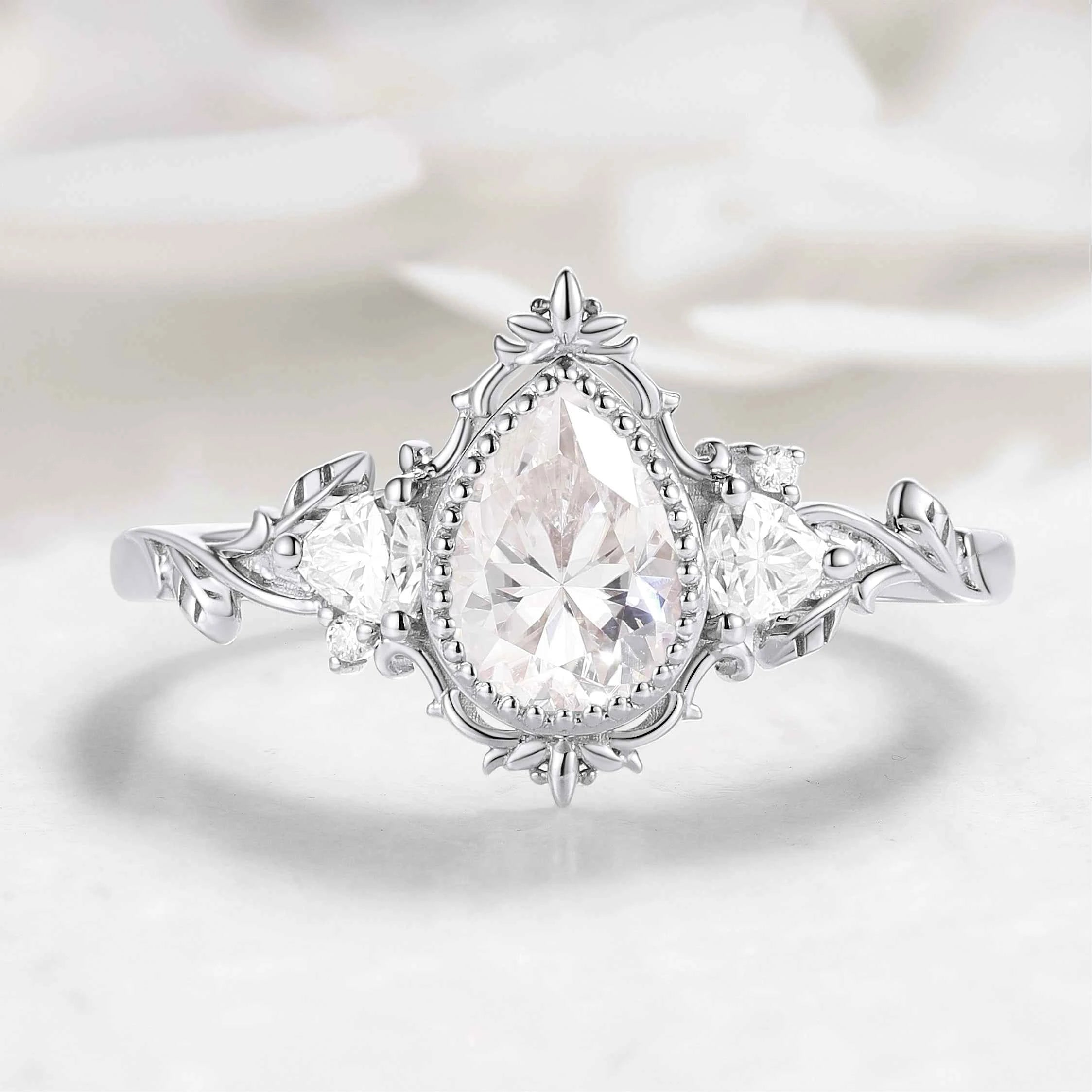 Nature-Inspired Pear Cut Moissanite Bezel Engagement Ring with Trillion Accent Stones - Emily