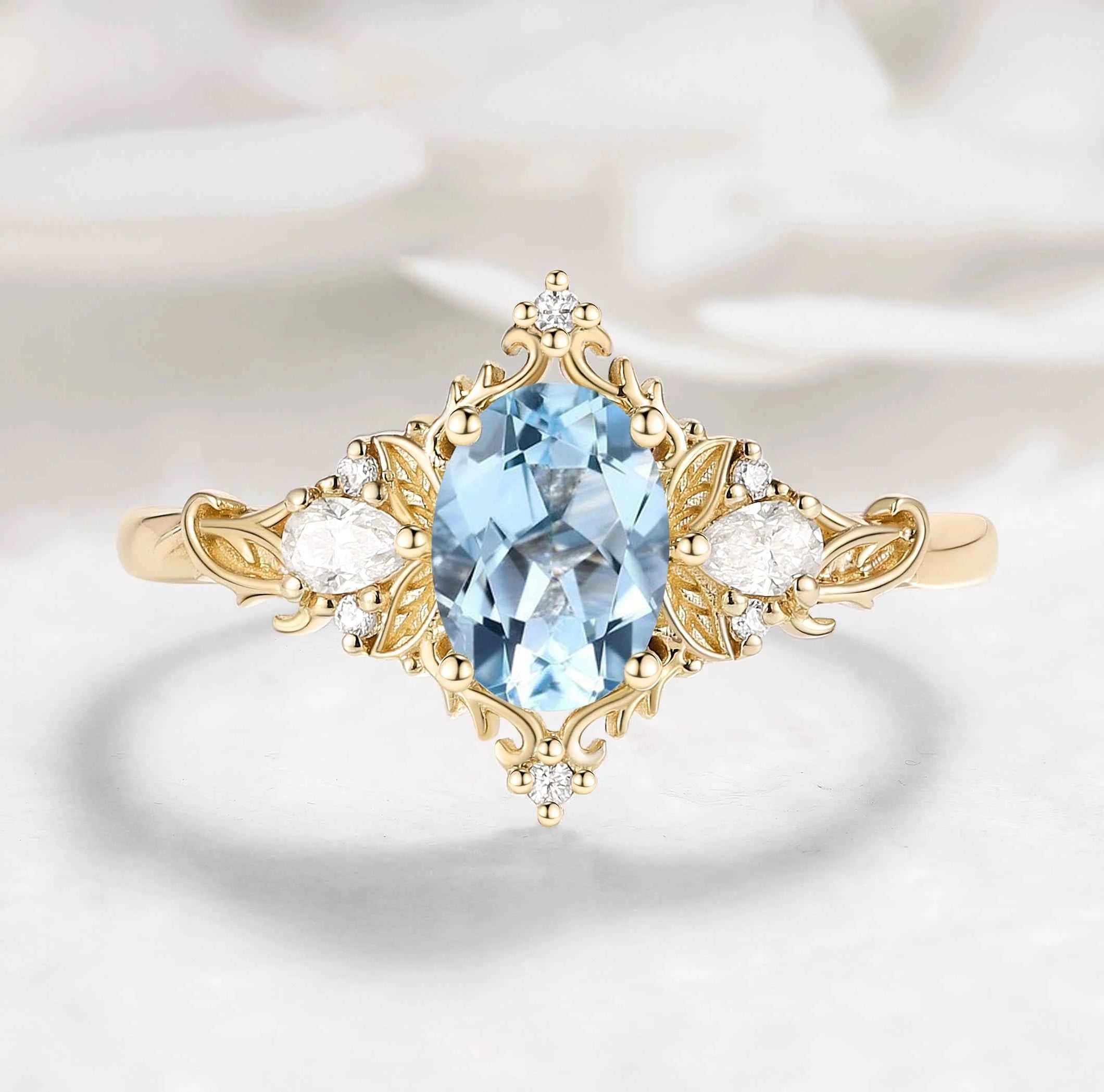 Oval Aquamarine & Pear Moissanite Engagement Ring with Leaf Motifs and Vine-Style Band - Seraphina