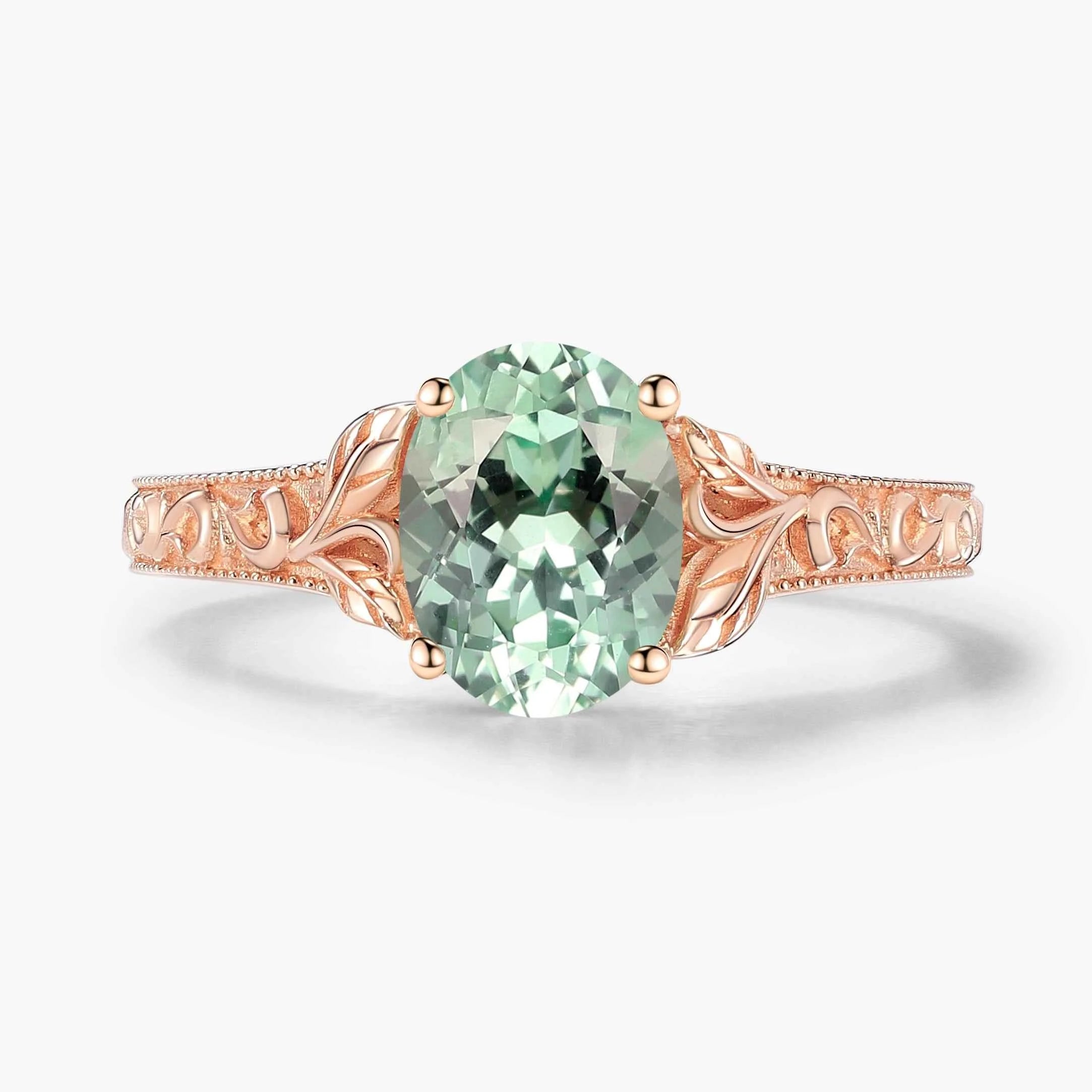 Oval-Cut Green Sapphire Engagement Ring with Leaf-Embraced Band