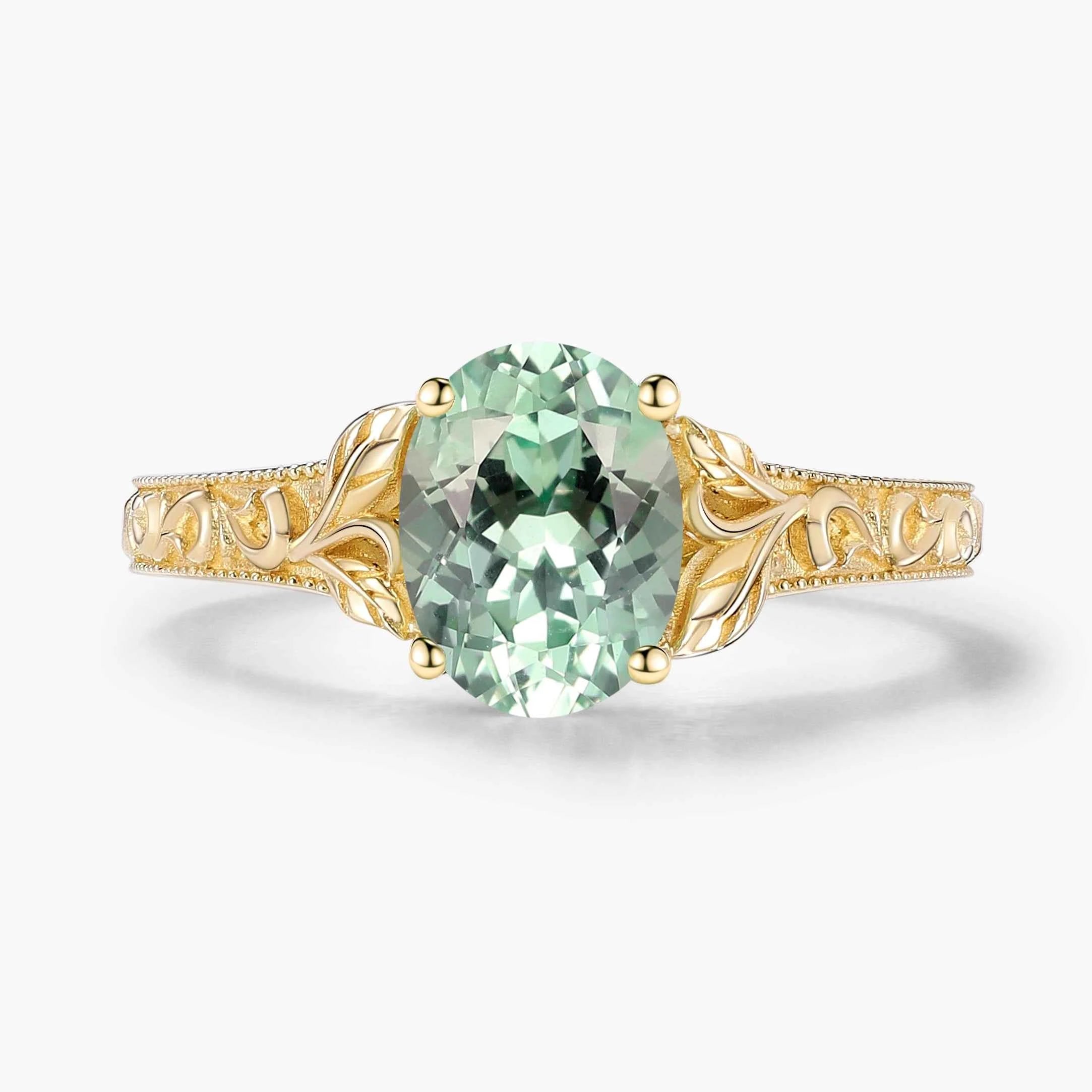 Oval-Cut Green Sapphire Engagement Ring with Leaf-Embraced Band