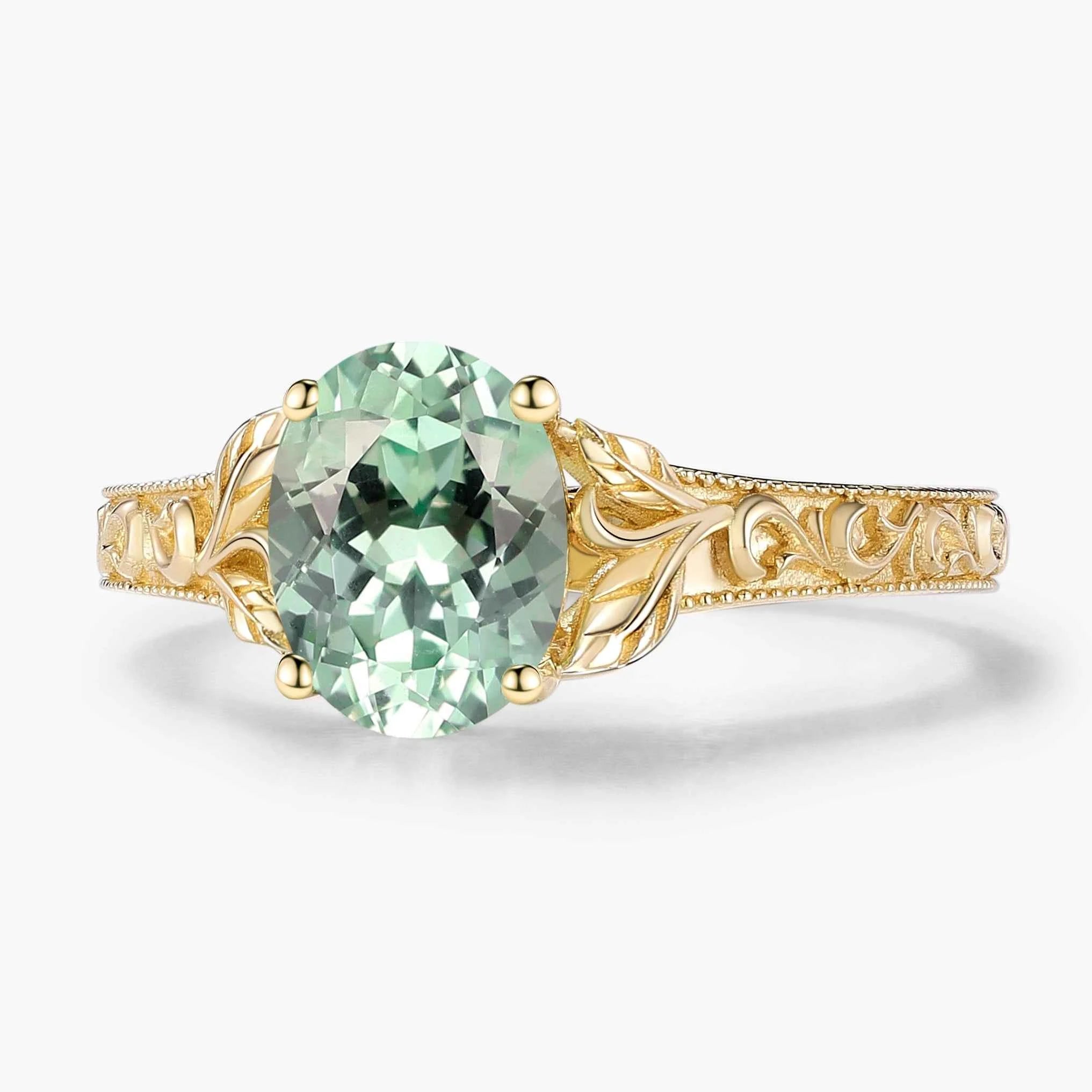 Oval-Cut Green Sapphire Engagement Ring with Leaf-Embraced Band