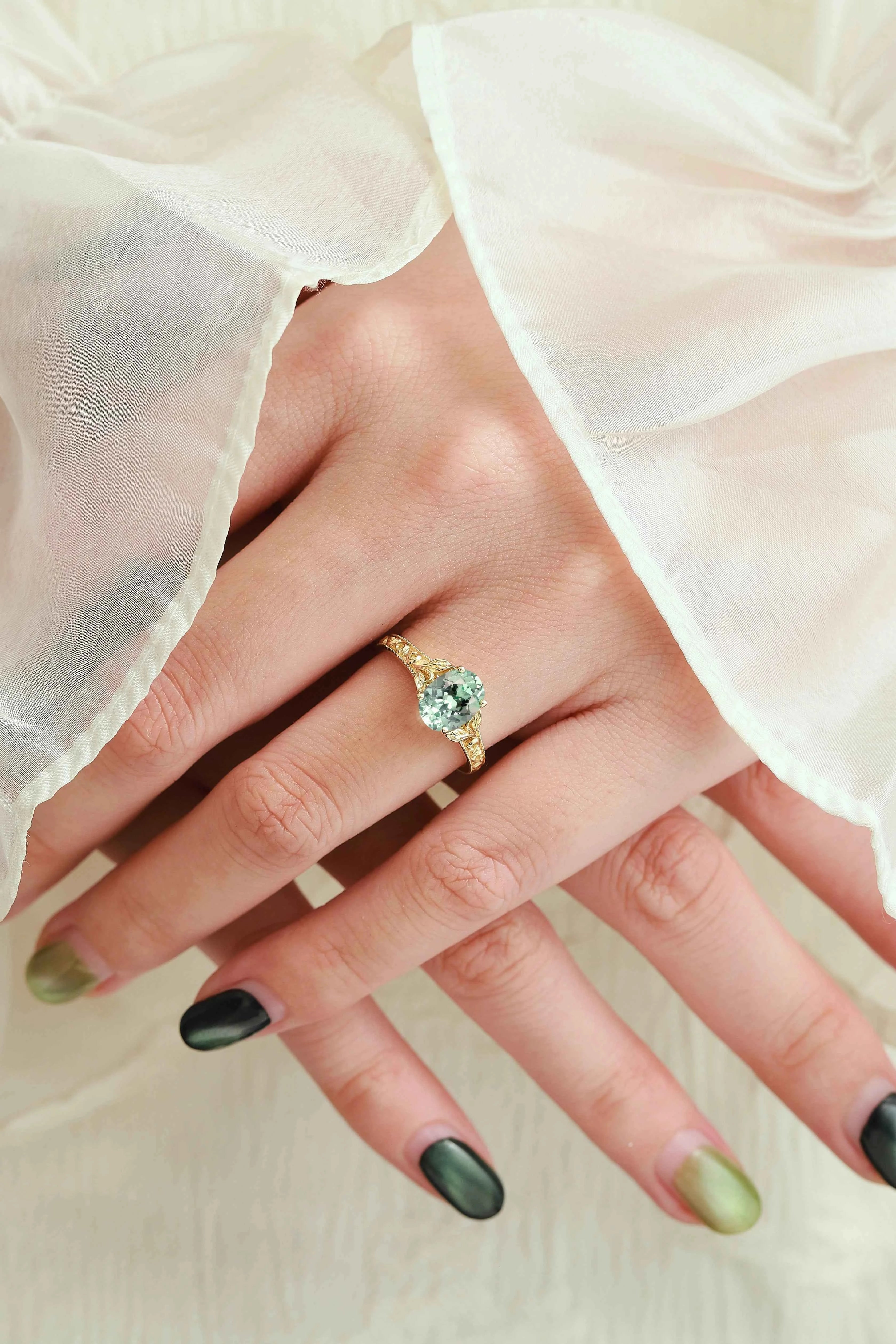 Custom Oval-Cut Green Sapphire Engagement Ring with Leaf-Embraced Band For Willoughby