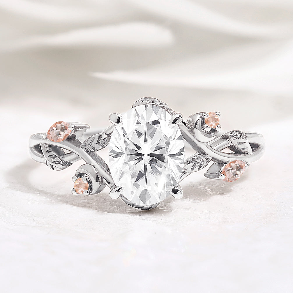 Oval Moissanite engagement ring with leaf design and morganite side stones