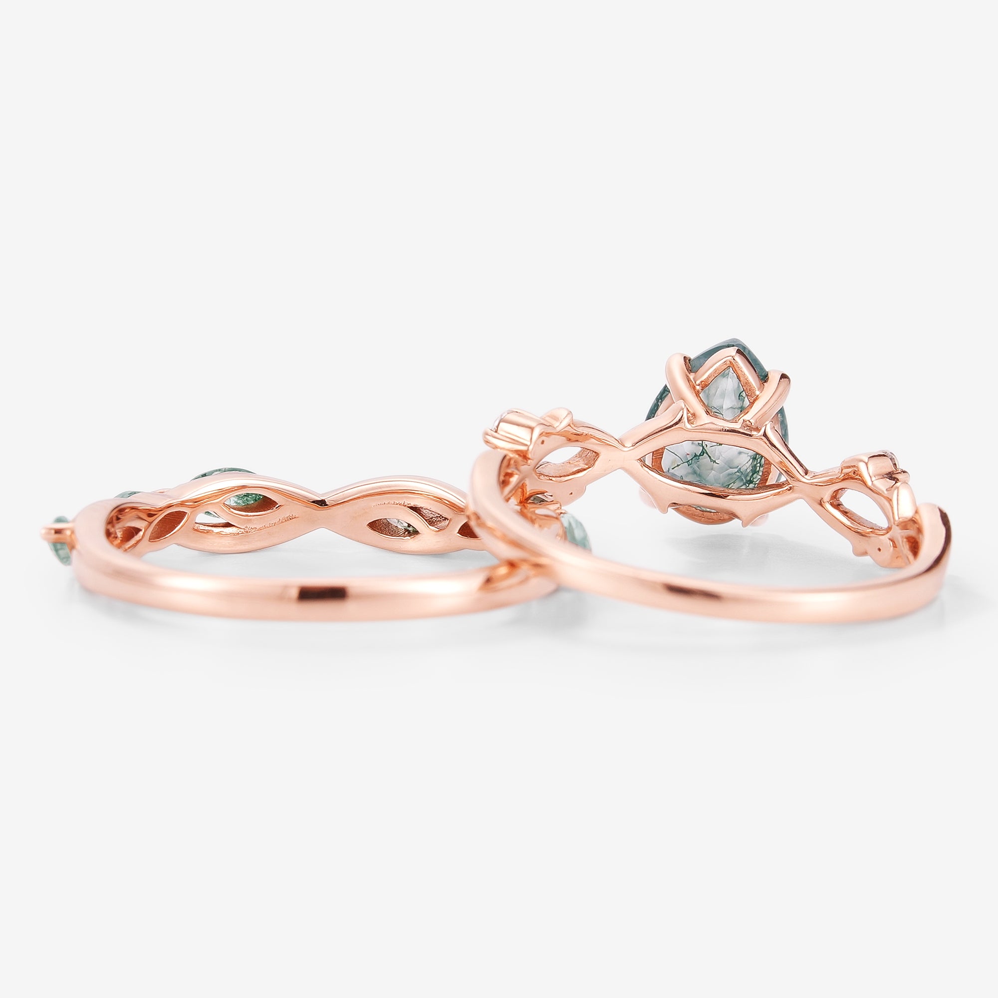 Rose gold moss agate engagement ring set with leaf design and straight wedding band.