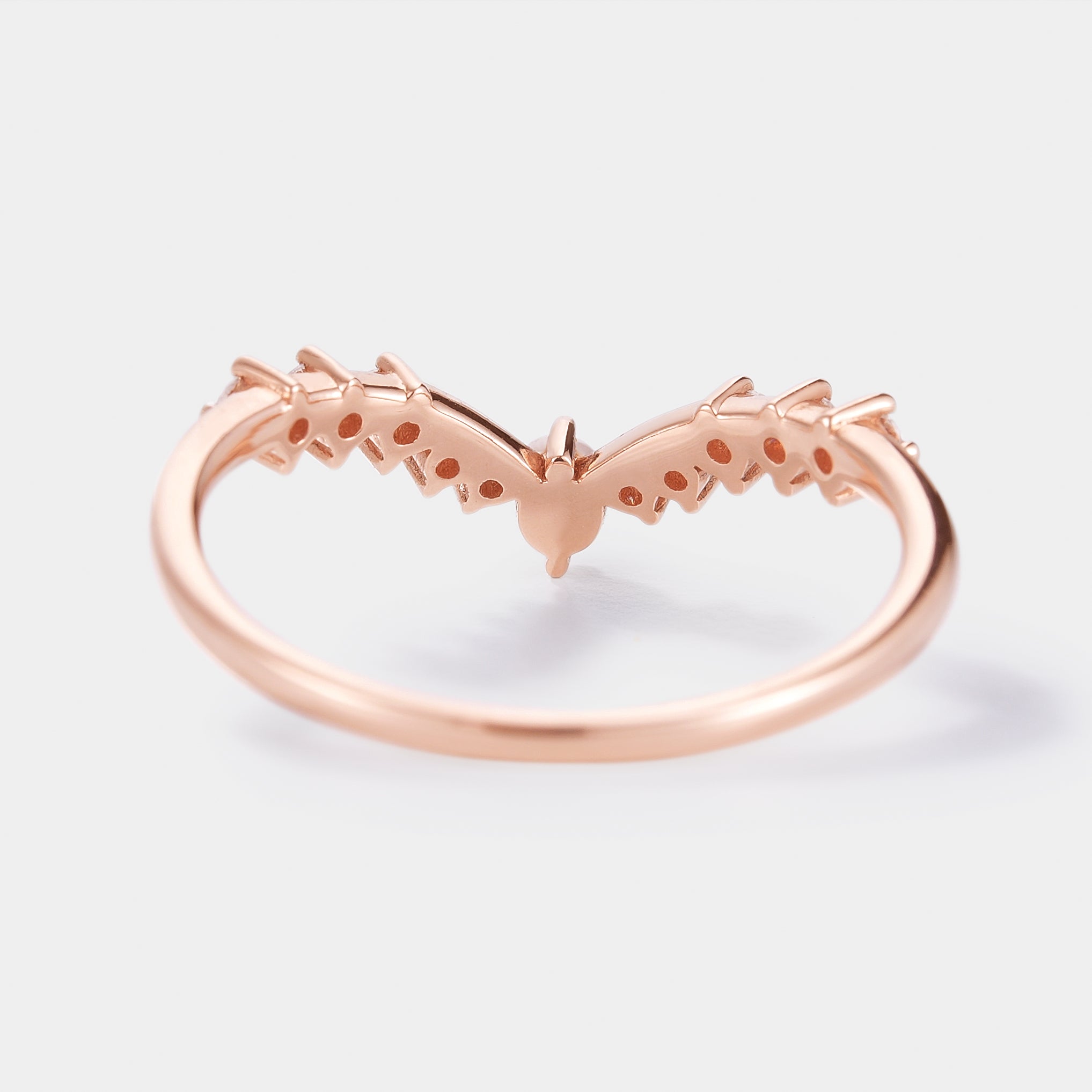 Rose gold curved wedding band with moissanite accents. Vintage bridal ring set.