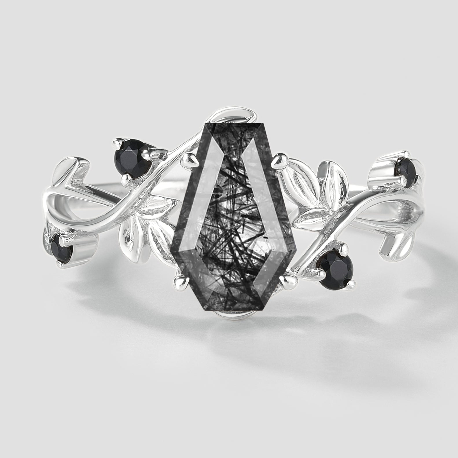 Black rutilated quartz engagement ring with leaf design