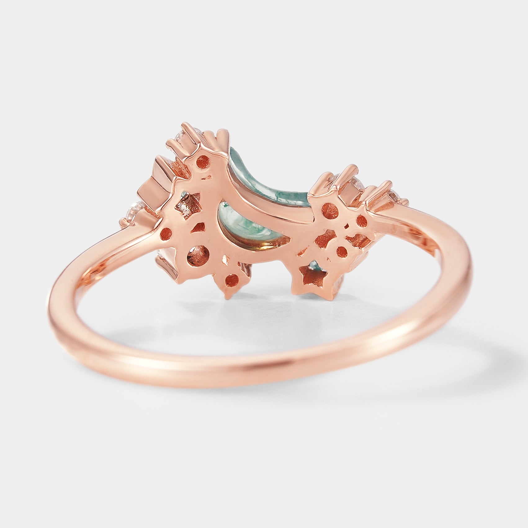 Rose gold moon-shaped Moss Agate engagement ring with star accents