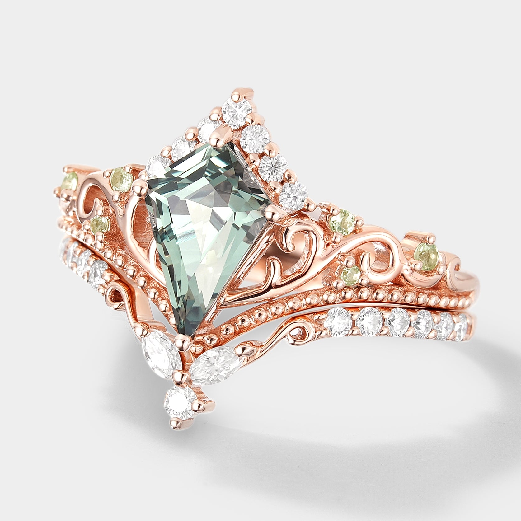Rose gold kite-cut green sapphire engagement ring set