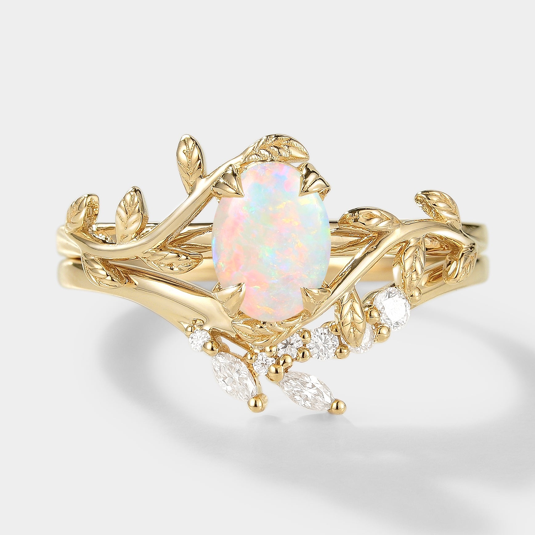 Gold opal leaf engagement ring set