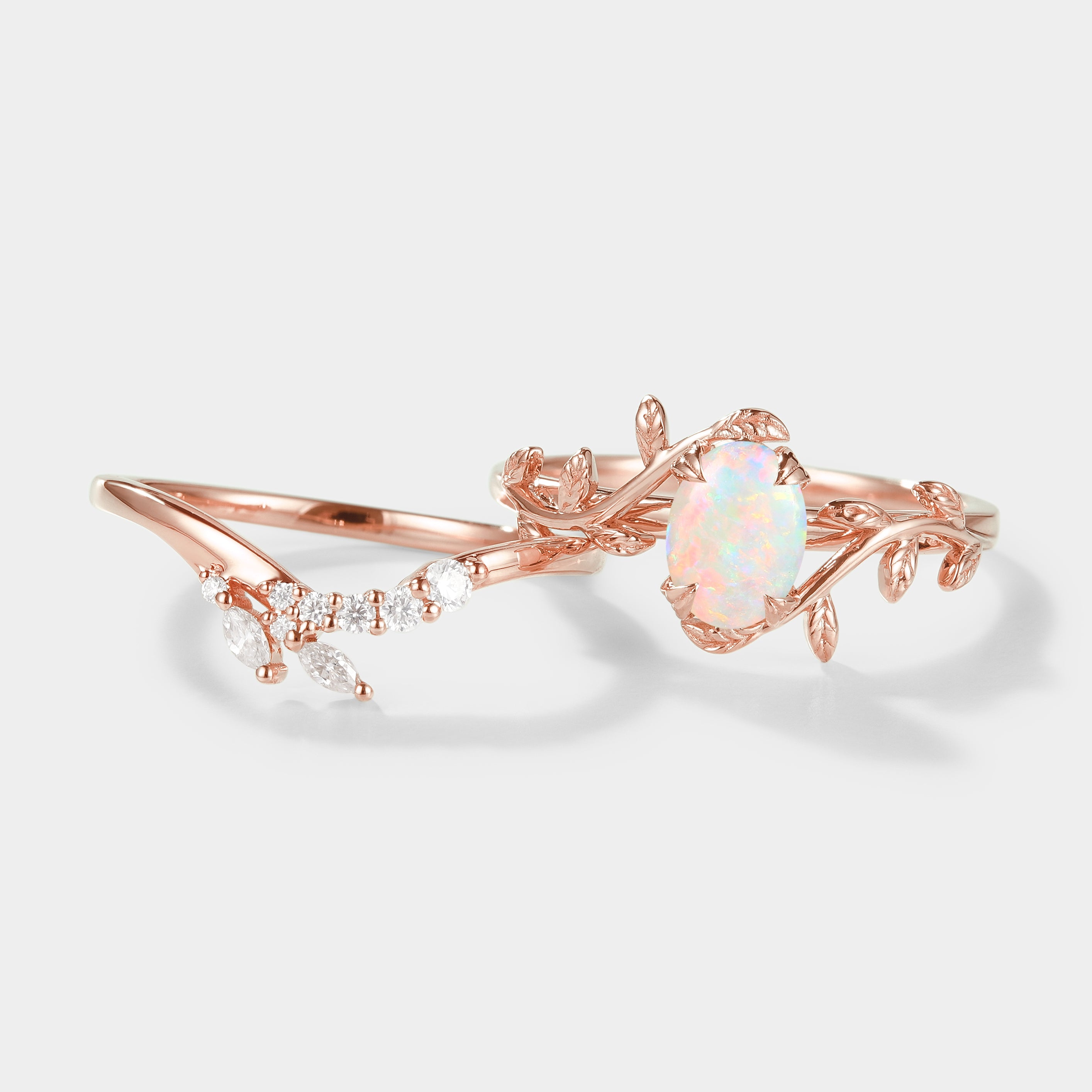 Nature-inspired opal engagement ring set with leaf design, rose gold