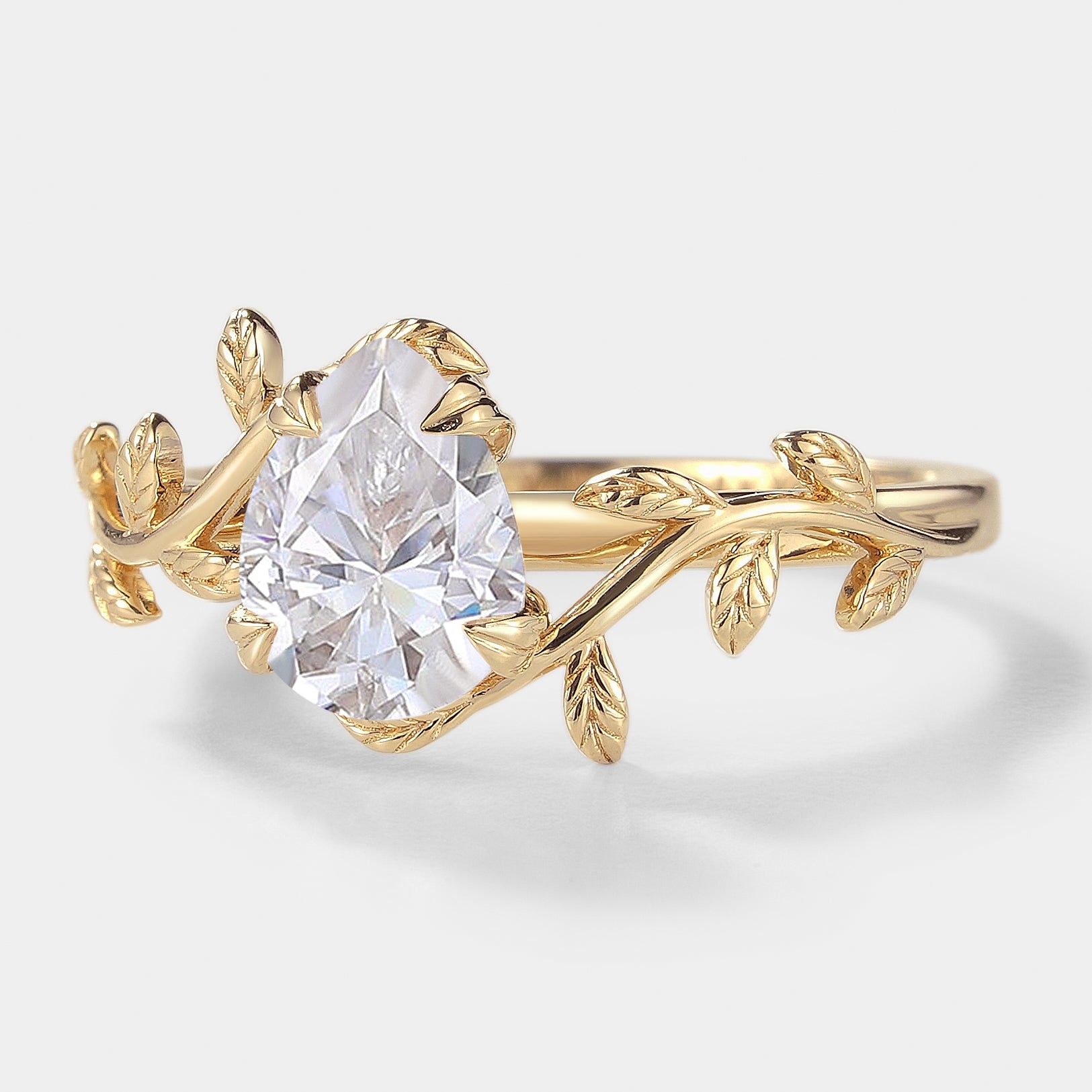 Gold Pear Cut Moissanite Leaf Ring
