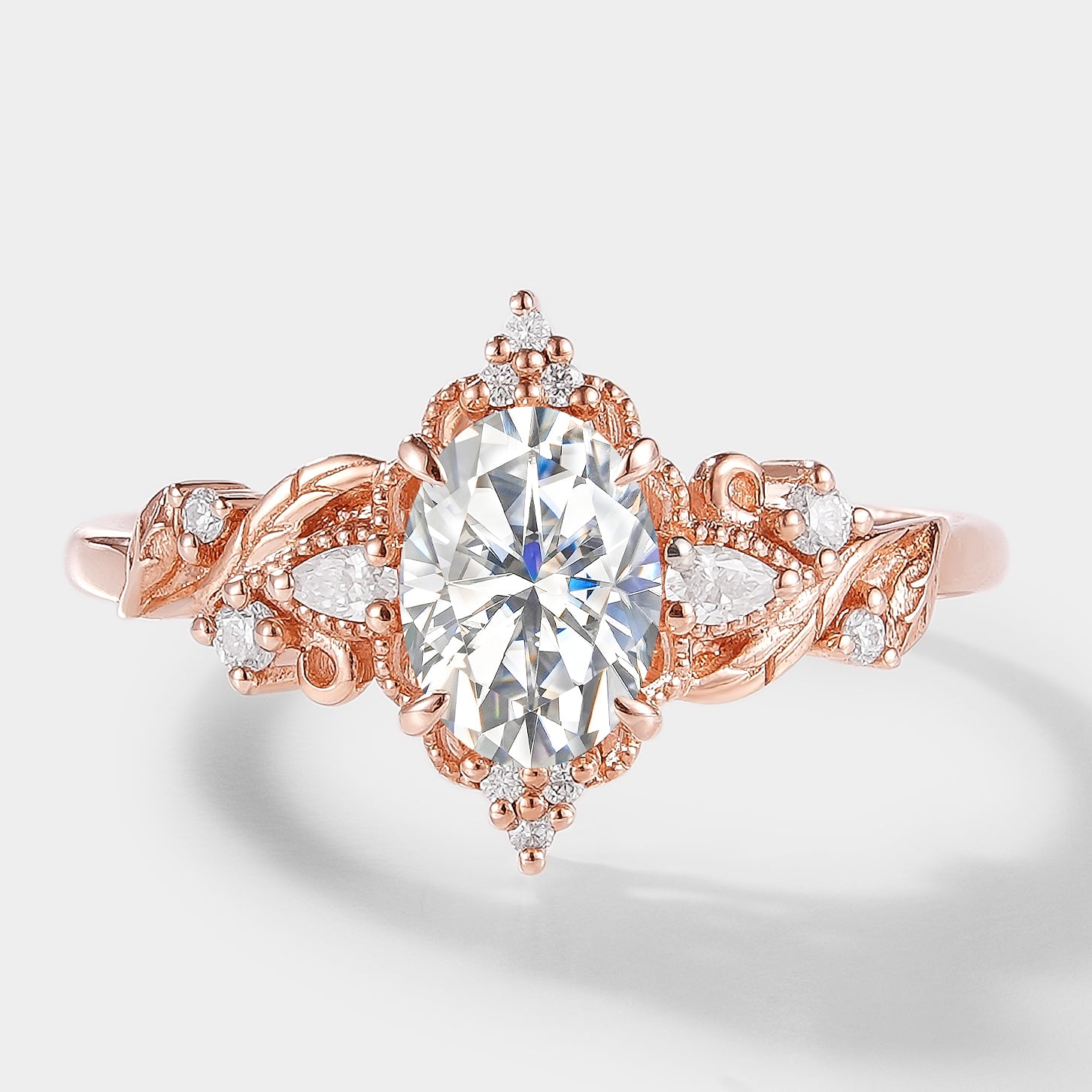 Oval moissanite engagement ring with leaf design in rose gold - Aurelia ring