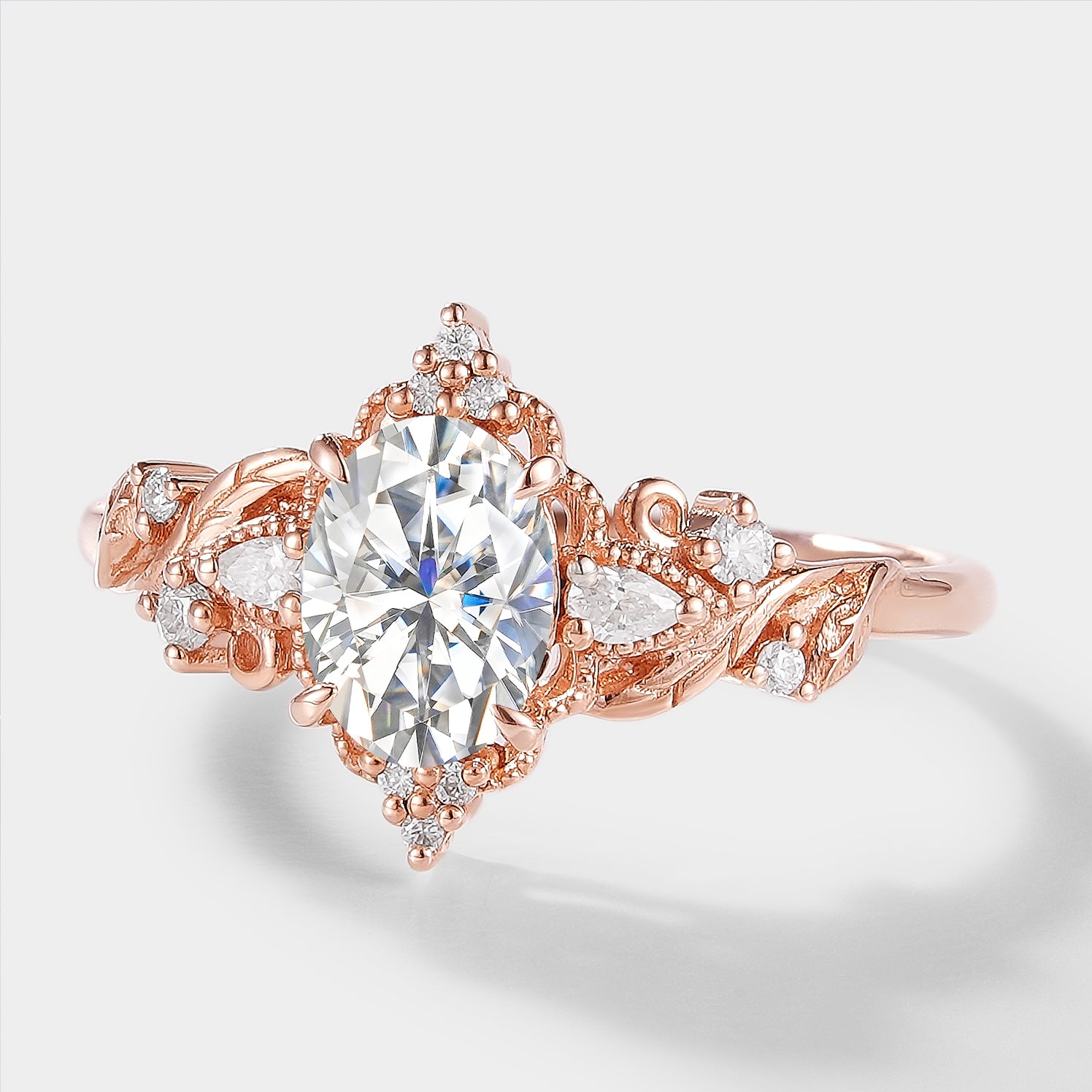 Rose gold oval moissanite engagement ring with leaf design - Aurelia ring, a Lahela Jewelry creation