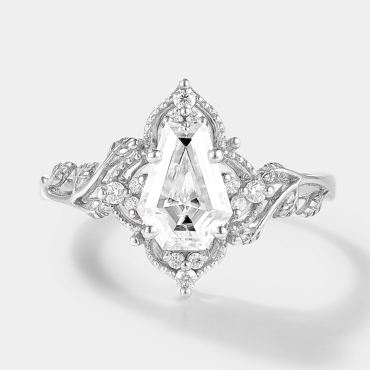 Unique coffin cut moissanite engagement ring with leaf details