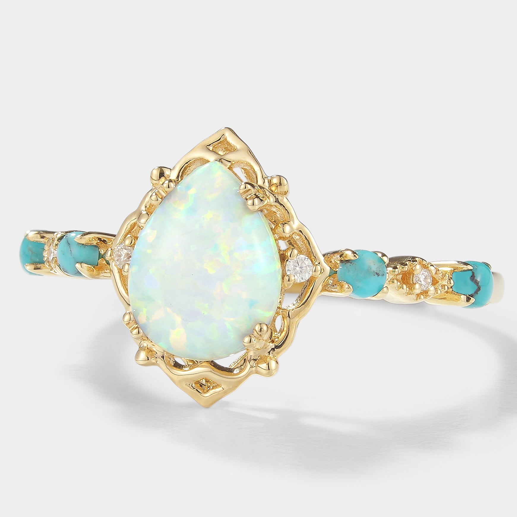 Vintage Pear Cut Opal Engagement Ring with Turquoise Accents