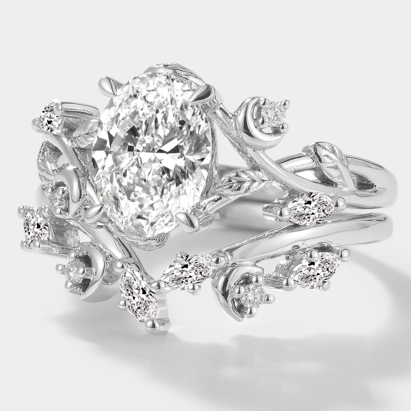 Nature-inspired oval lab grown diamond engagement ring and wedding band set