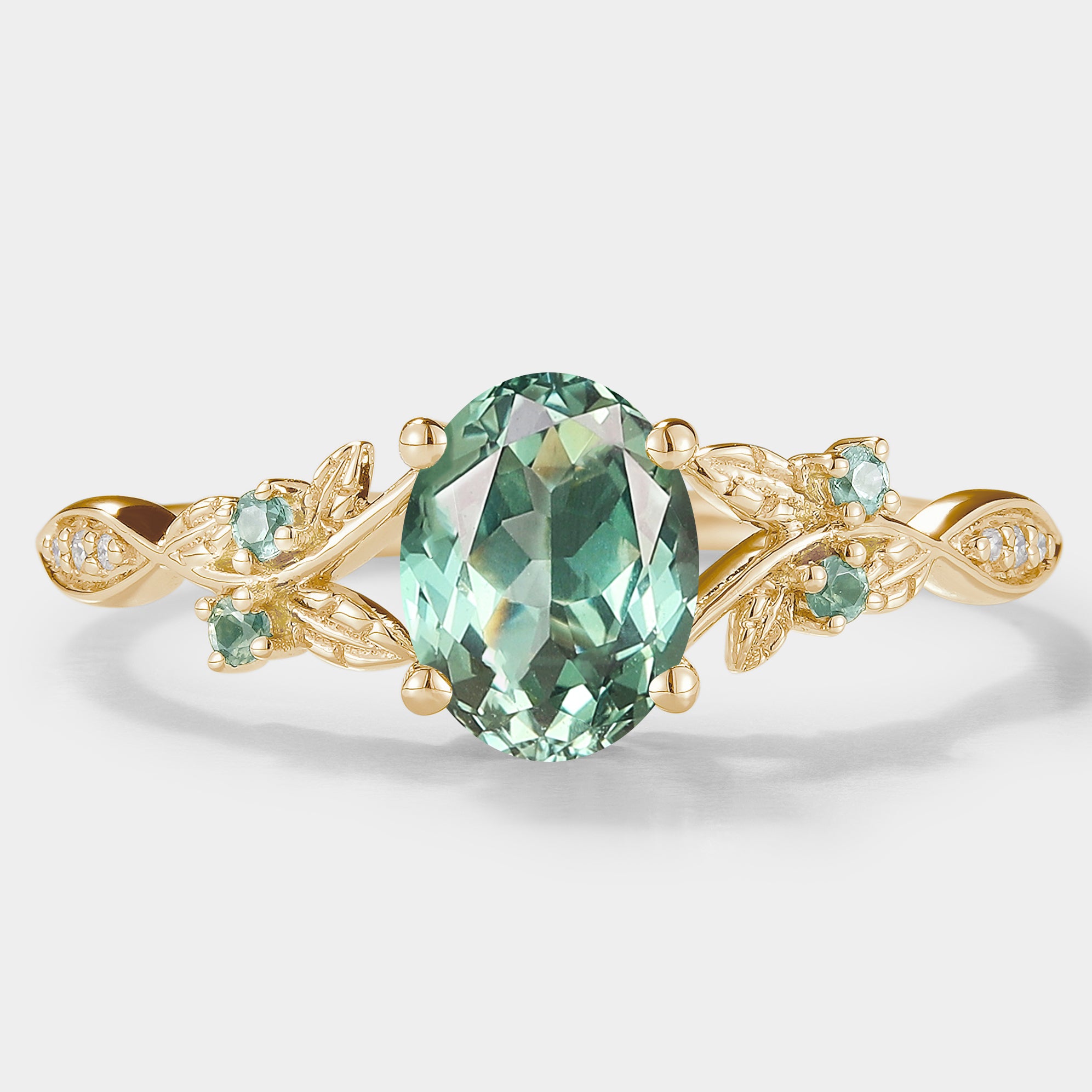 Oval Green Sapphire Engagement Ring with Leaf Detail