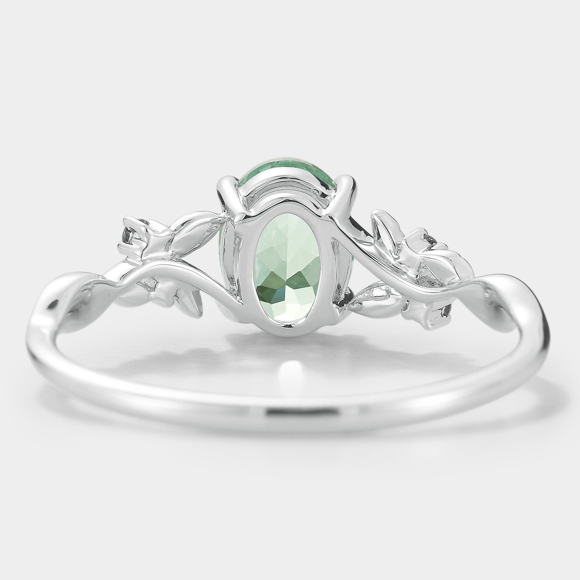 Nature-inspired green sapphire engagement ring