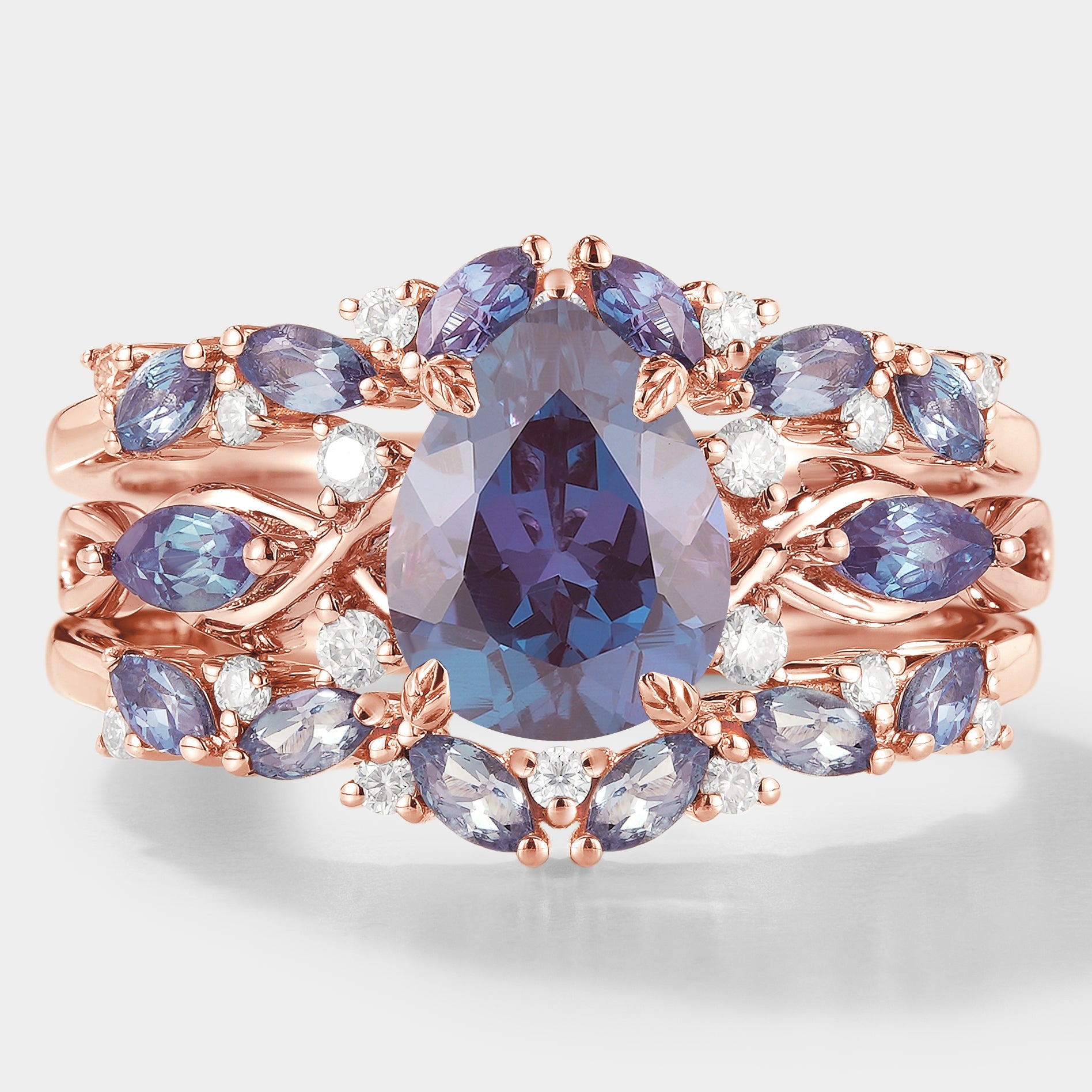 Alexandrite engagement ring with enhancer wedding band, rose gold, pear cut