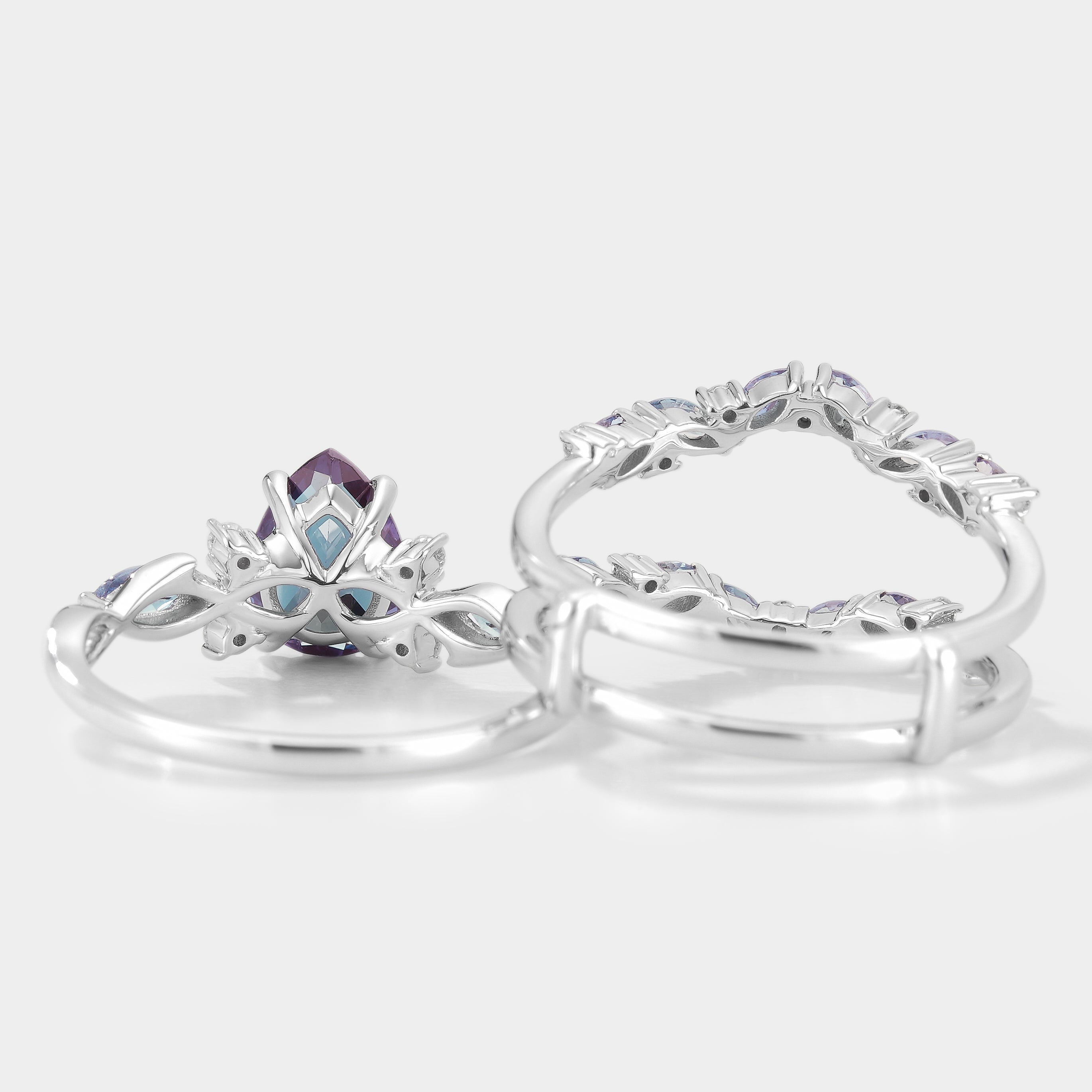 Alexandrite engagement ring set with enhancer band, nature-inspired design