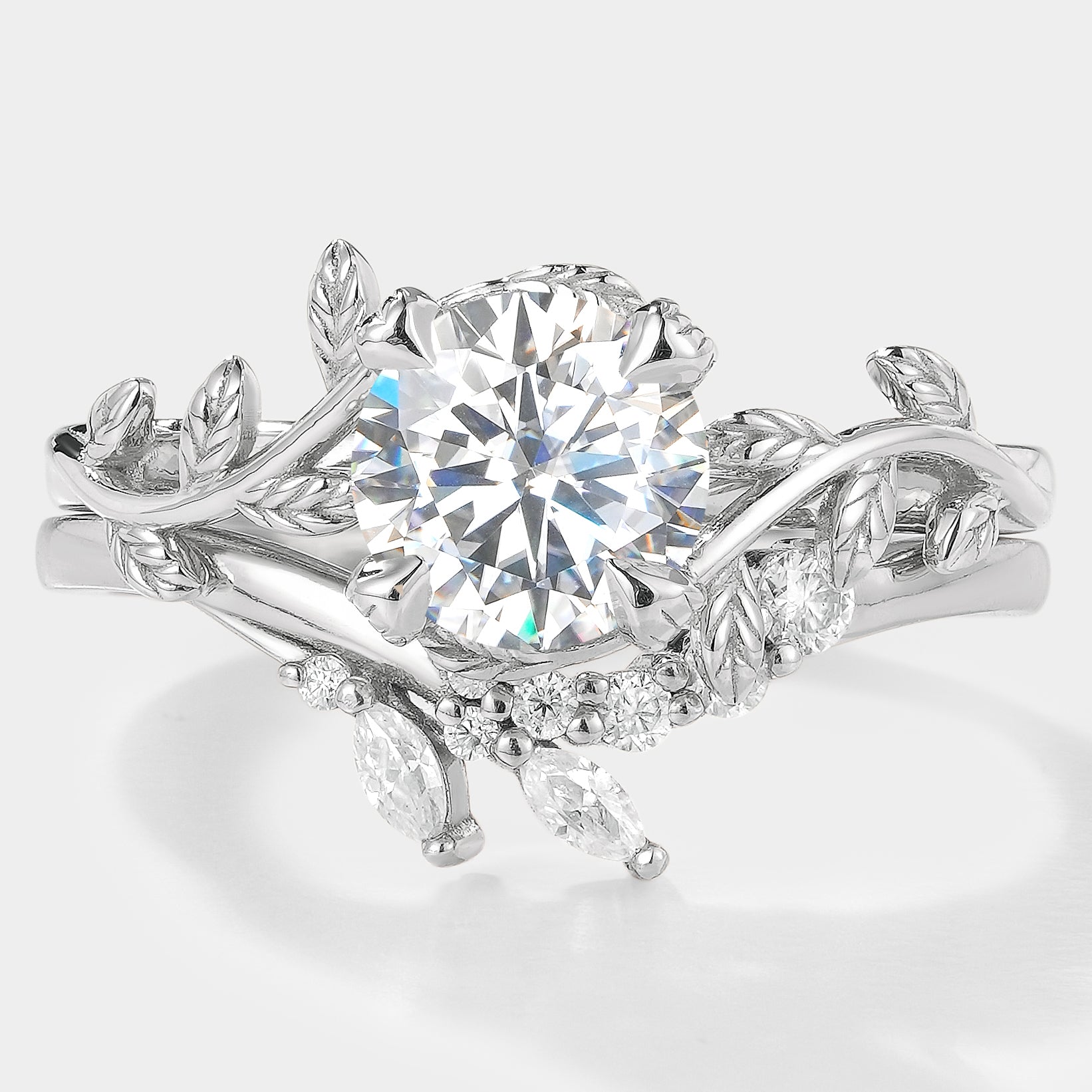 Moissanite leaf engagement ring set with chevron band