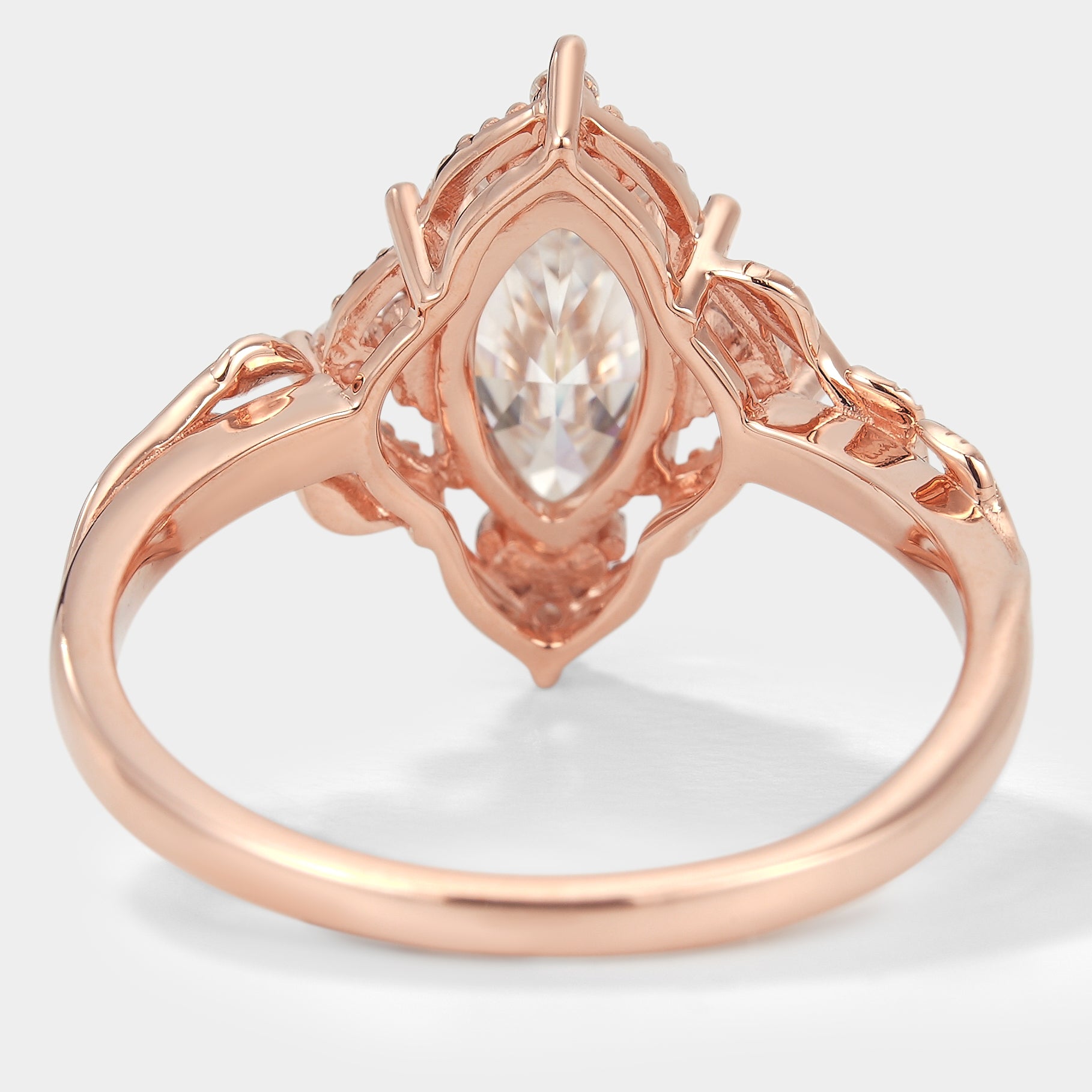 Rose gold marquise moissanite ring with leaf design