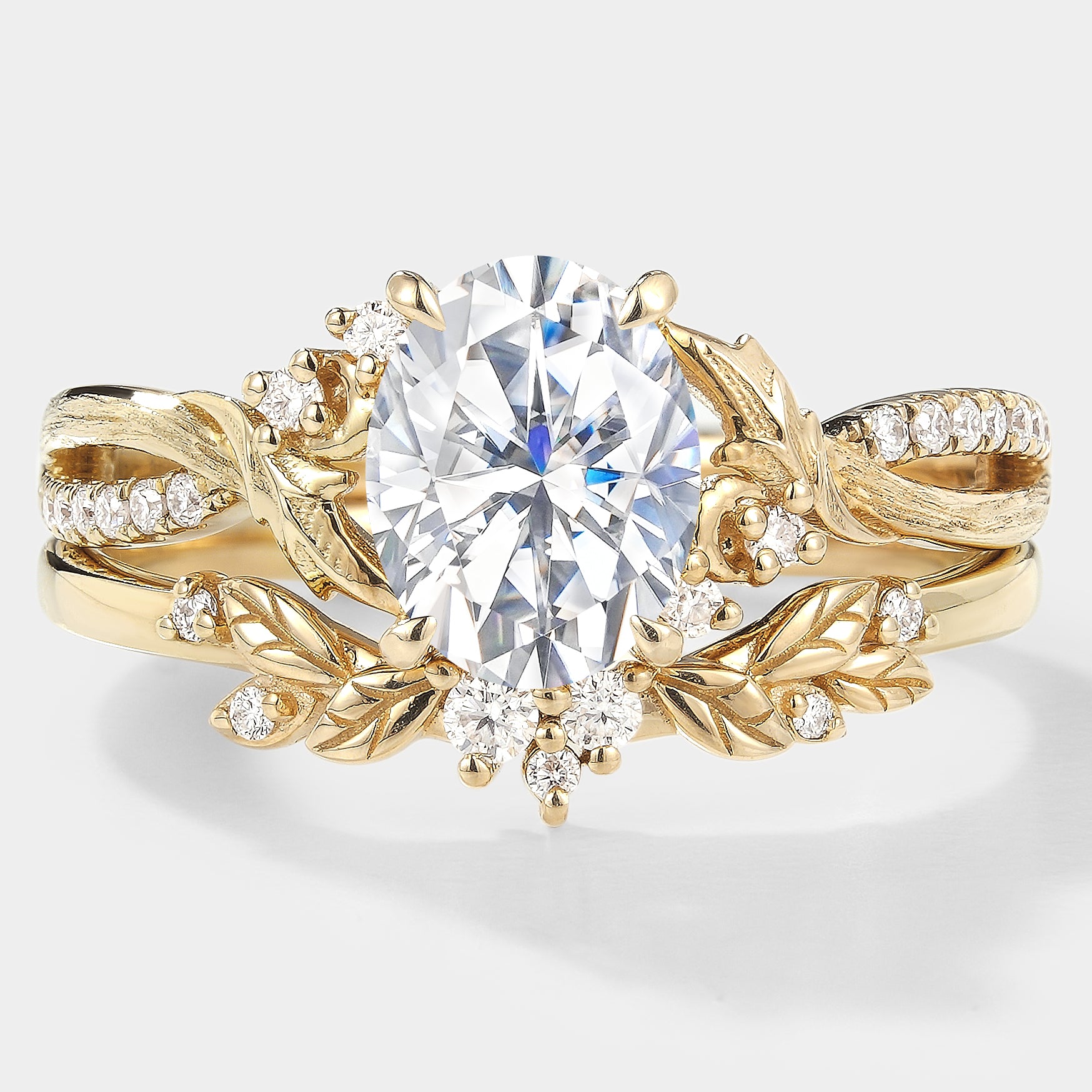 Nature-inspired moissanite engagement ring with leaf and bark texture