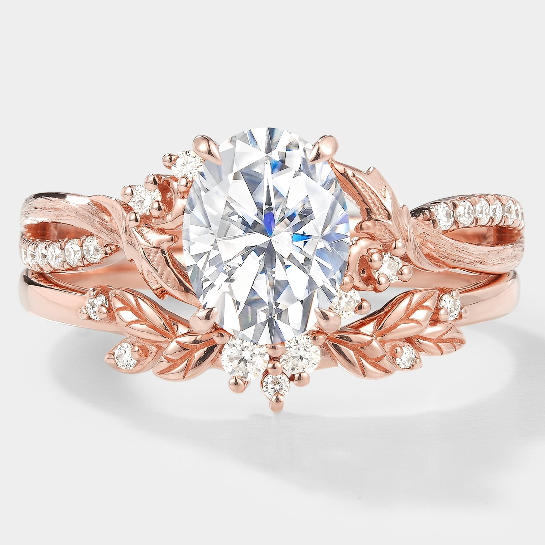 Rose gold moissanite ring set with leaf and floral design