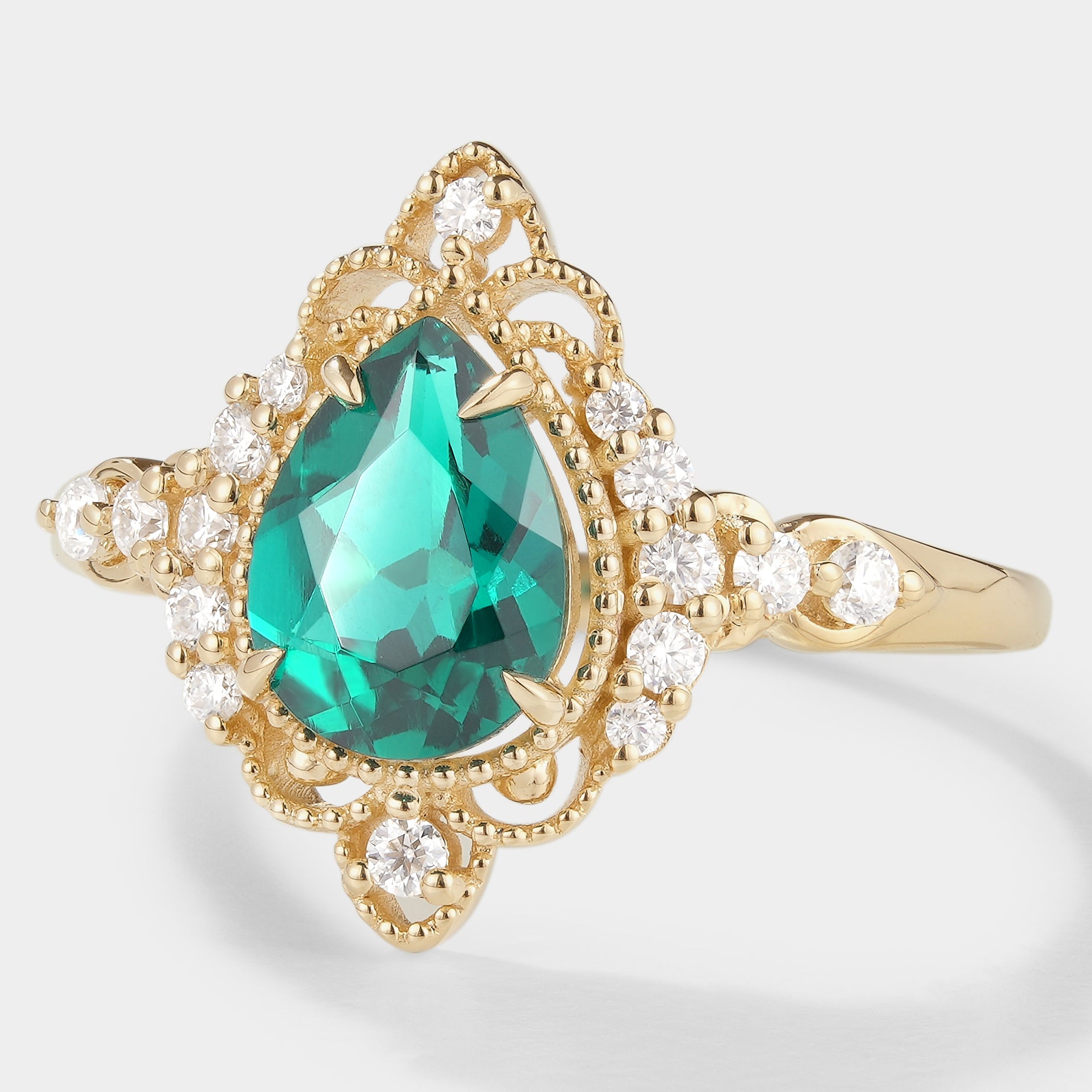 Vintage Pear Cut Emerald Engagement Ring