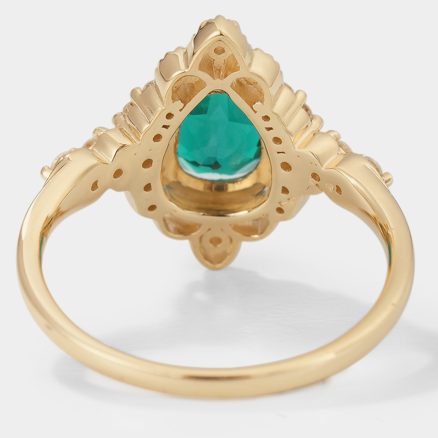 Back view of Pear-cut lab emerald ring, palace style