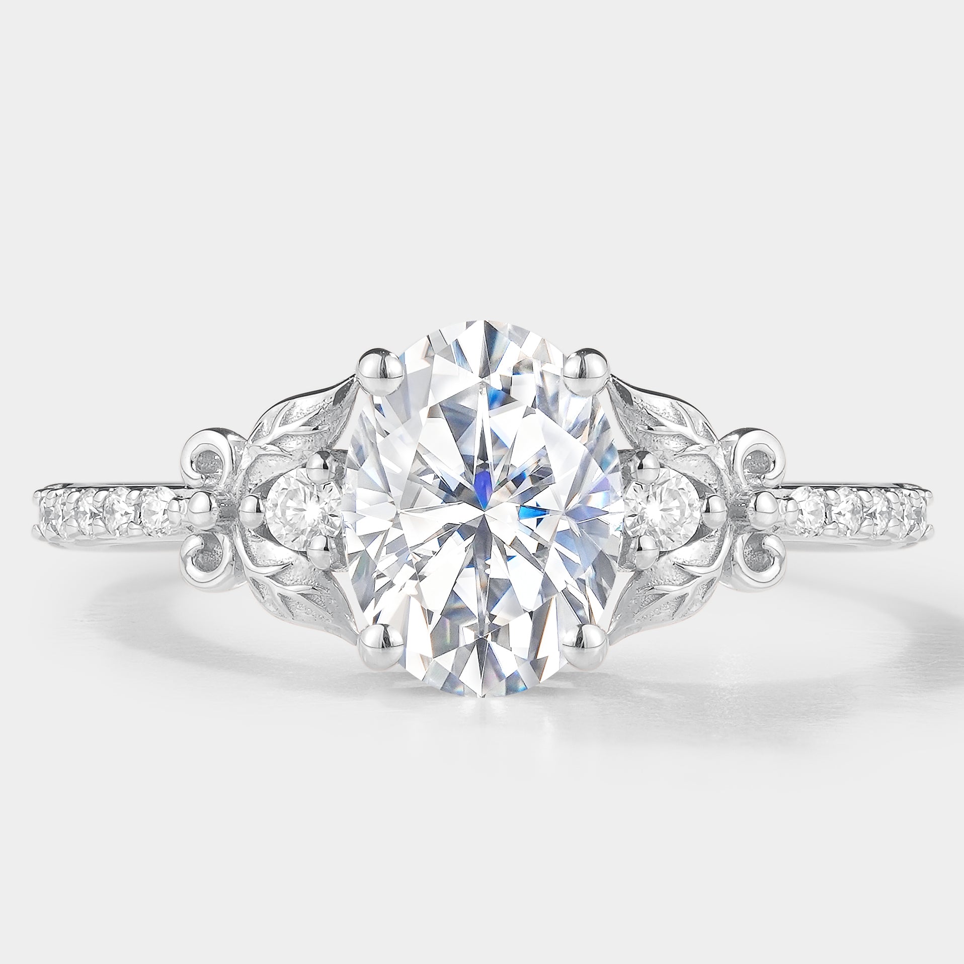 Oval cut moissanite leaf engagement ring