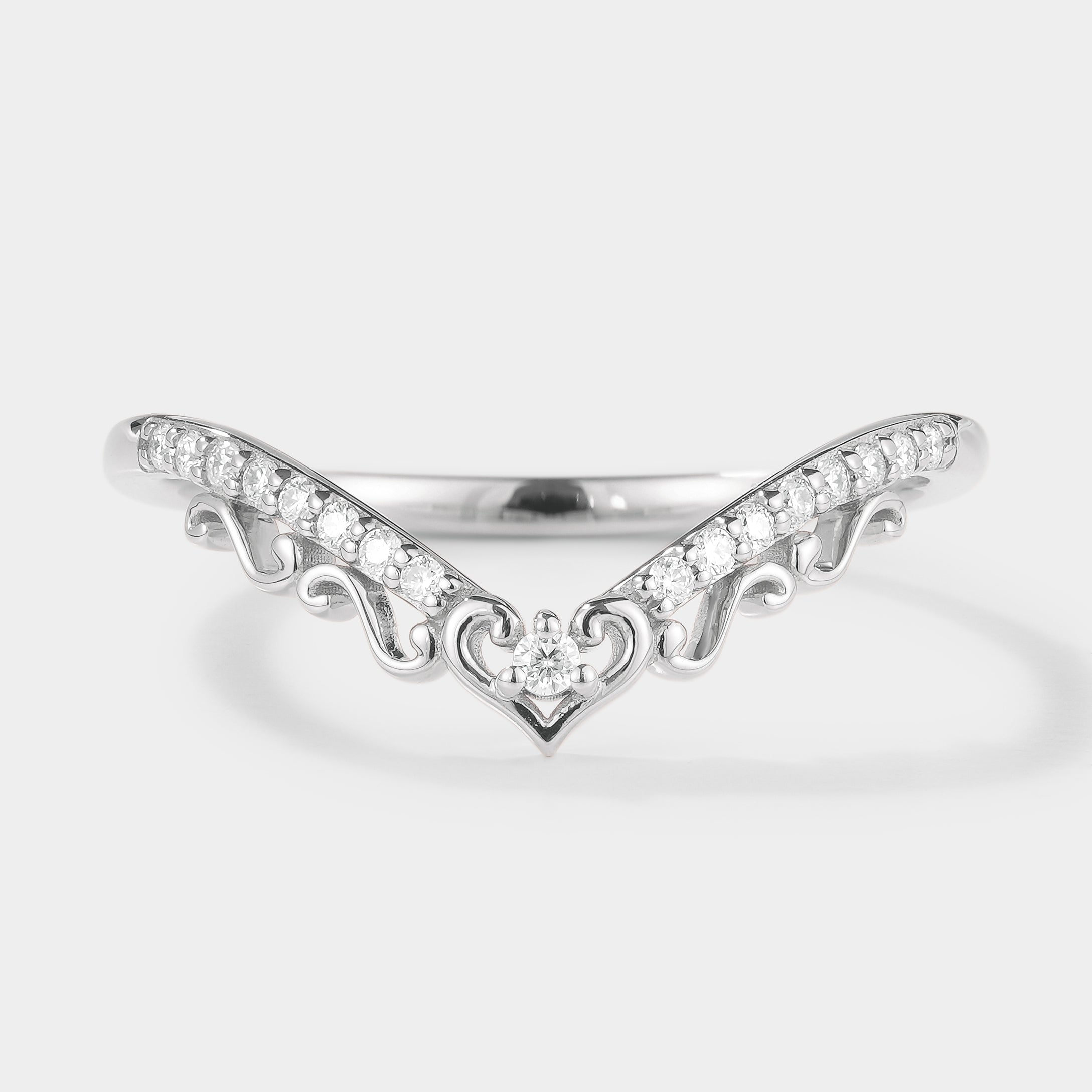 Nature-inspired Chevron wedding band with moissanite stones