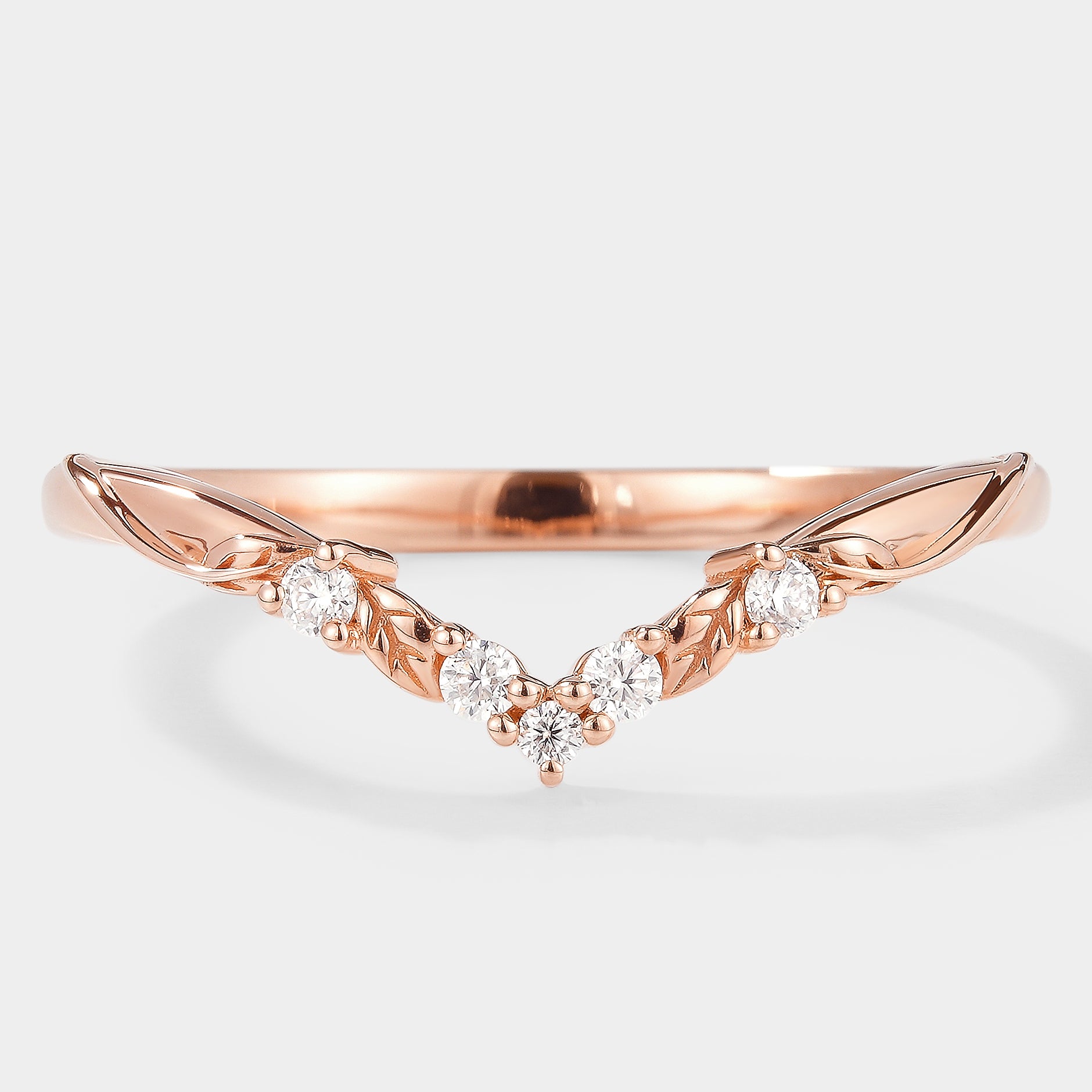 V-shaped leaf moissanite wedding band in rose gold