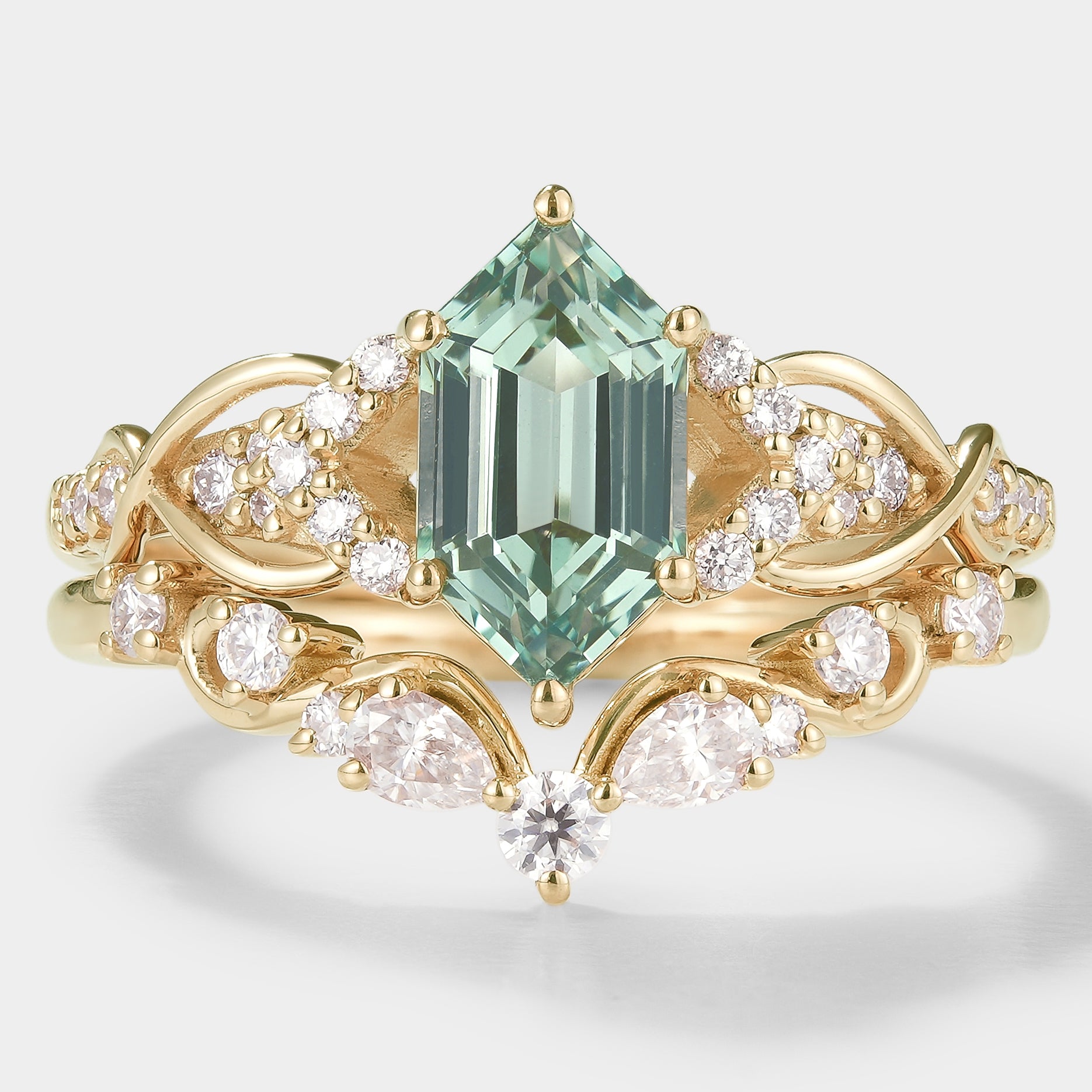 Nature-inspired hexagon green sapphire bridal set