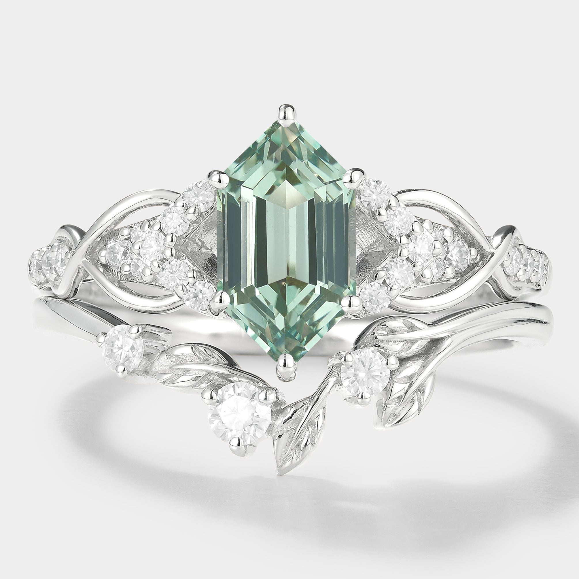 Nature-inspired green sapphire engagement ring and wedding band set