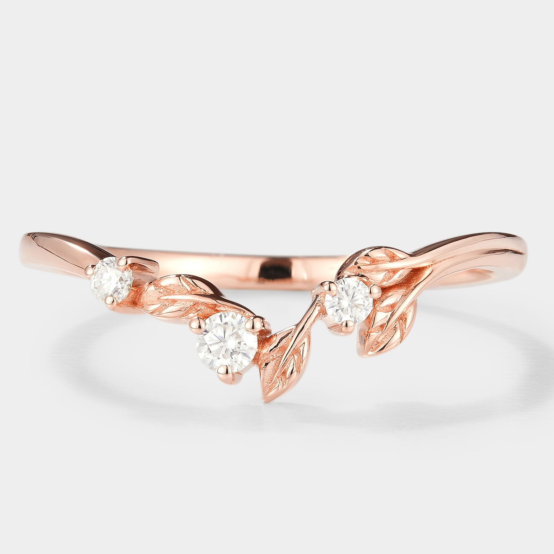 Rose gold leaf wedding band with moissanite stones