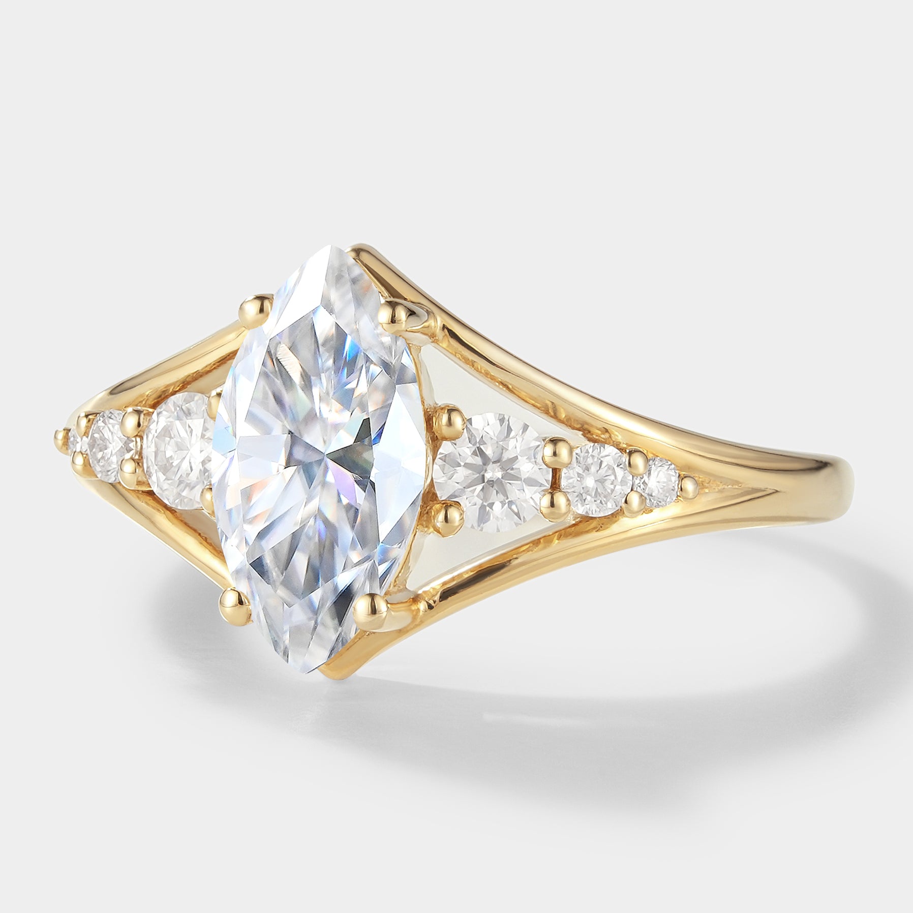 Marquise moissanite engagement ring, 14k gold with side stones. Vintage bridal ring, ideal for proposals.