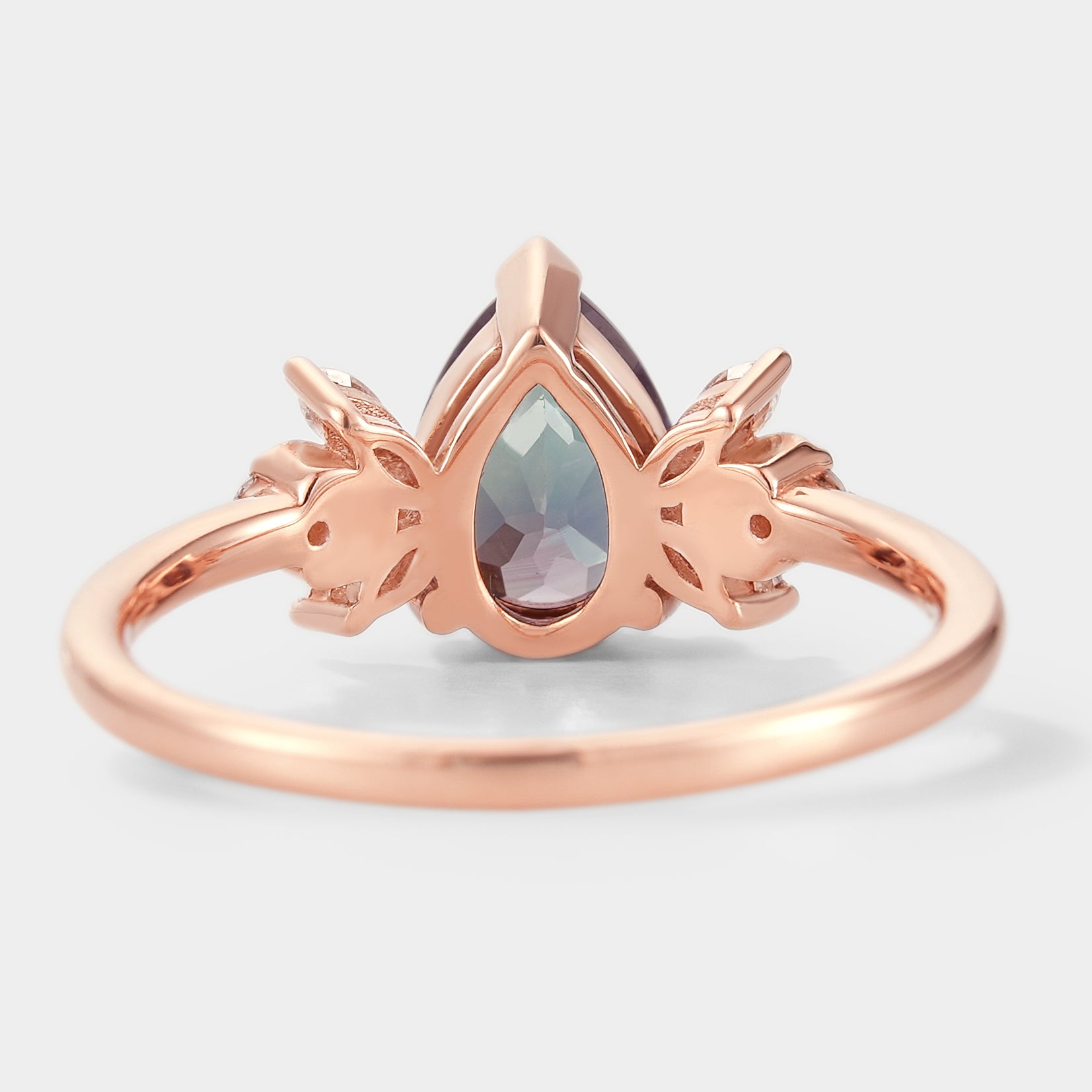 Rose gold pear-cut alexandrite ring with floral moissanite accents, back view, bridal set, vintage design